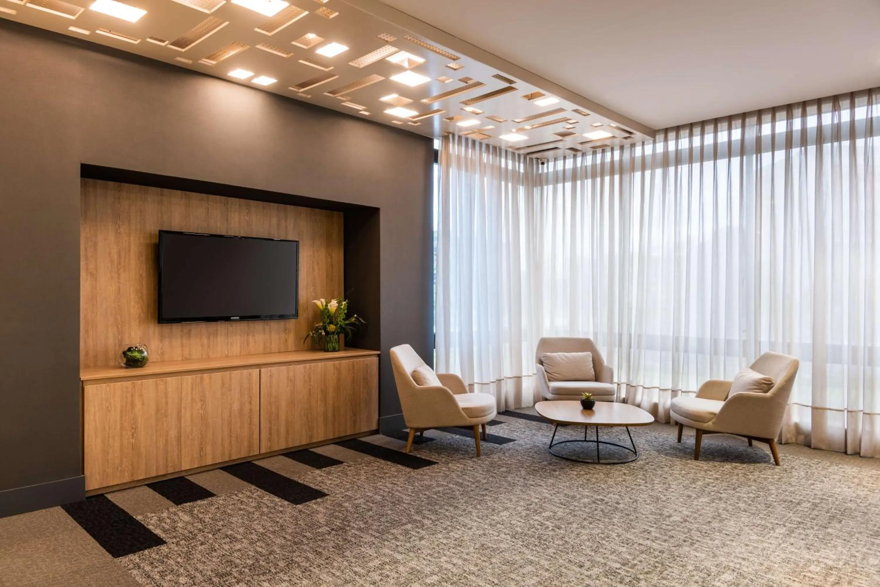 Lounge or bar in NH Collection Bogota WTC Royal