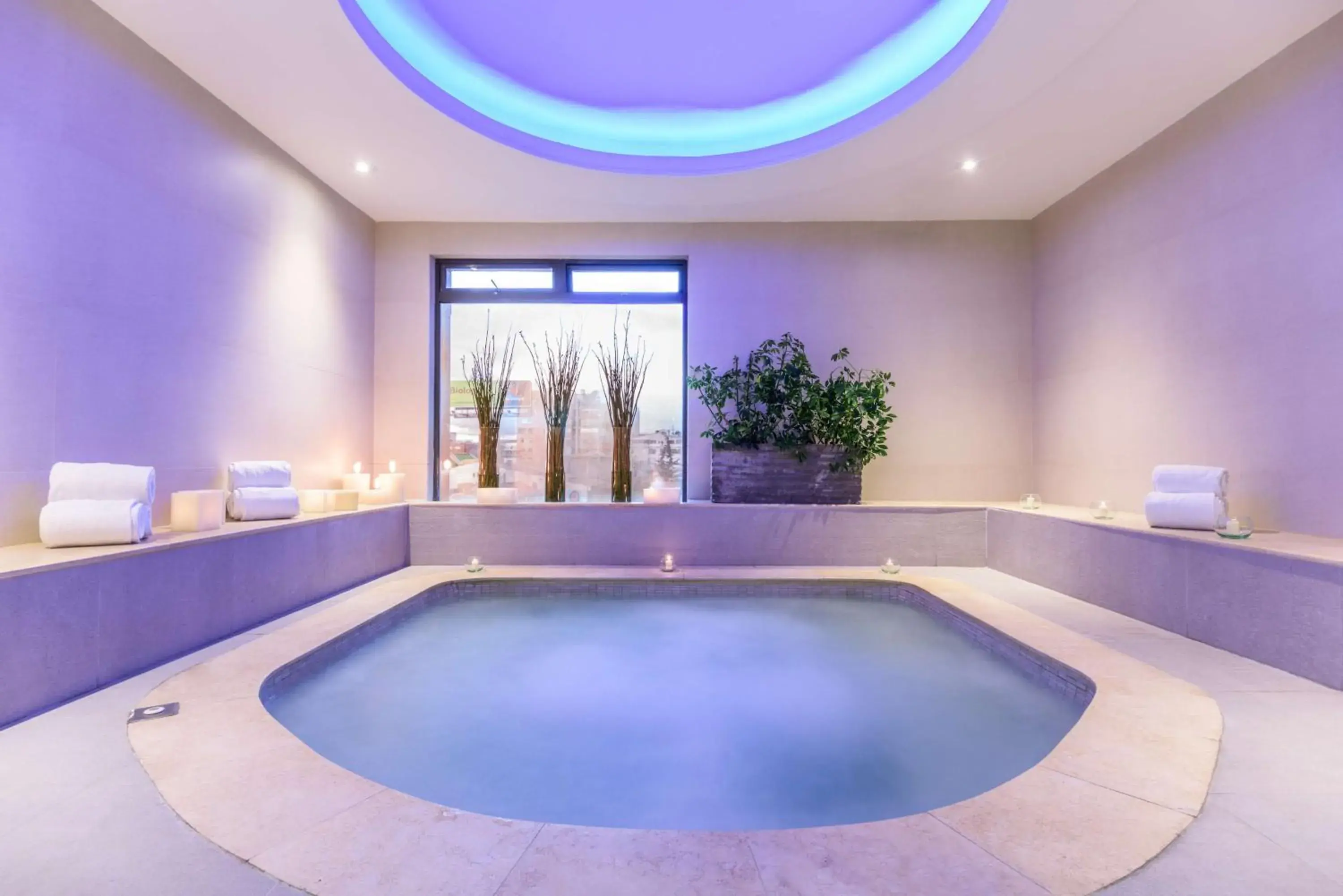 Pool view in NH Collection Bogotá Royal Teleport Pool view in NH Collection Bogotá Royal Teleport