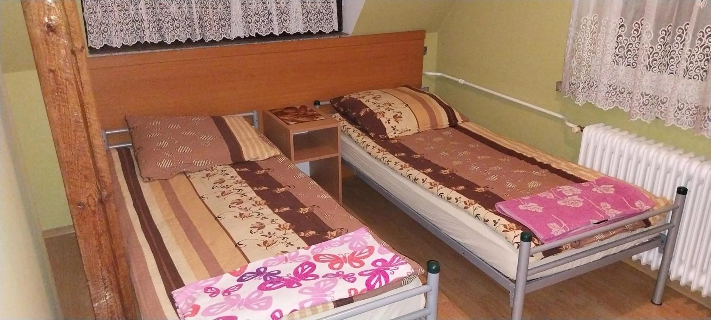 Bed in Uslugi Hotelowe Władysław