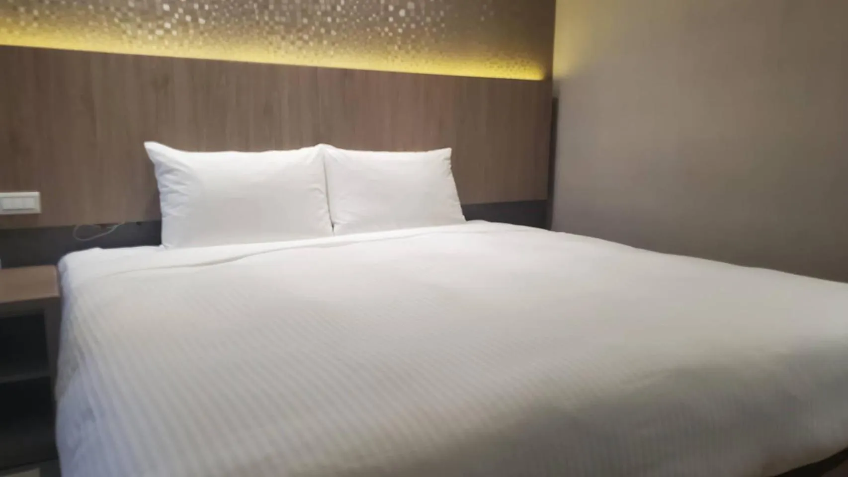 Bed in KDM Hotel