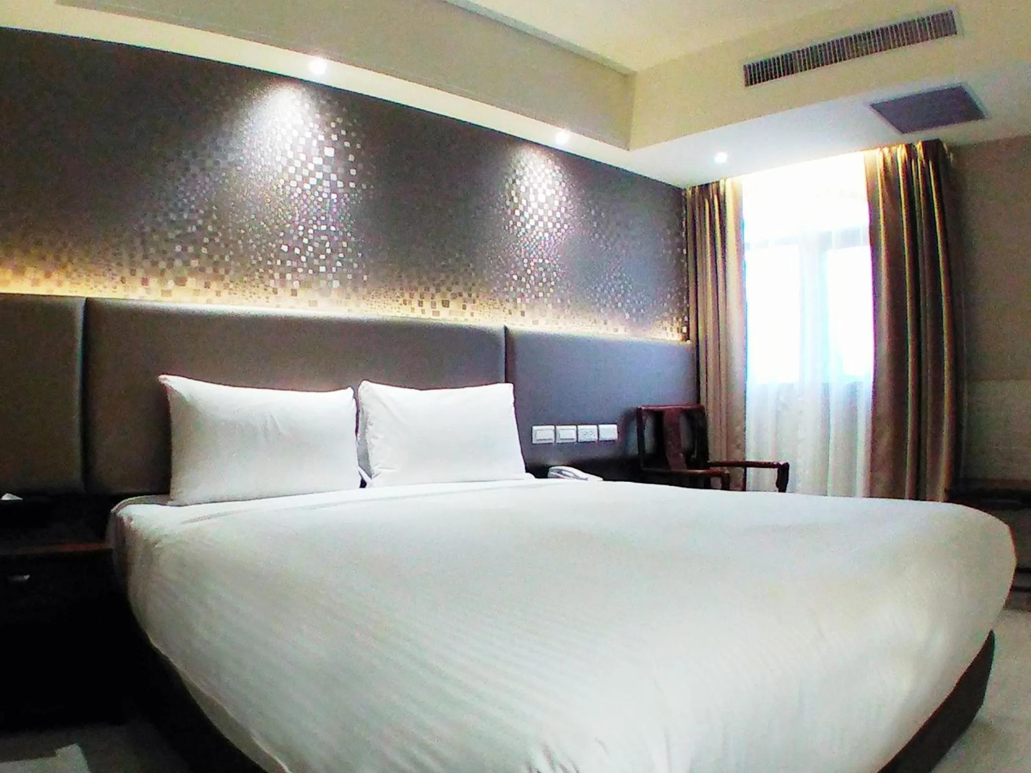Bed in KDM Hotel