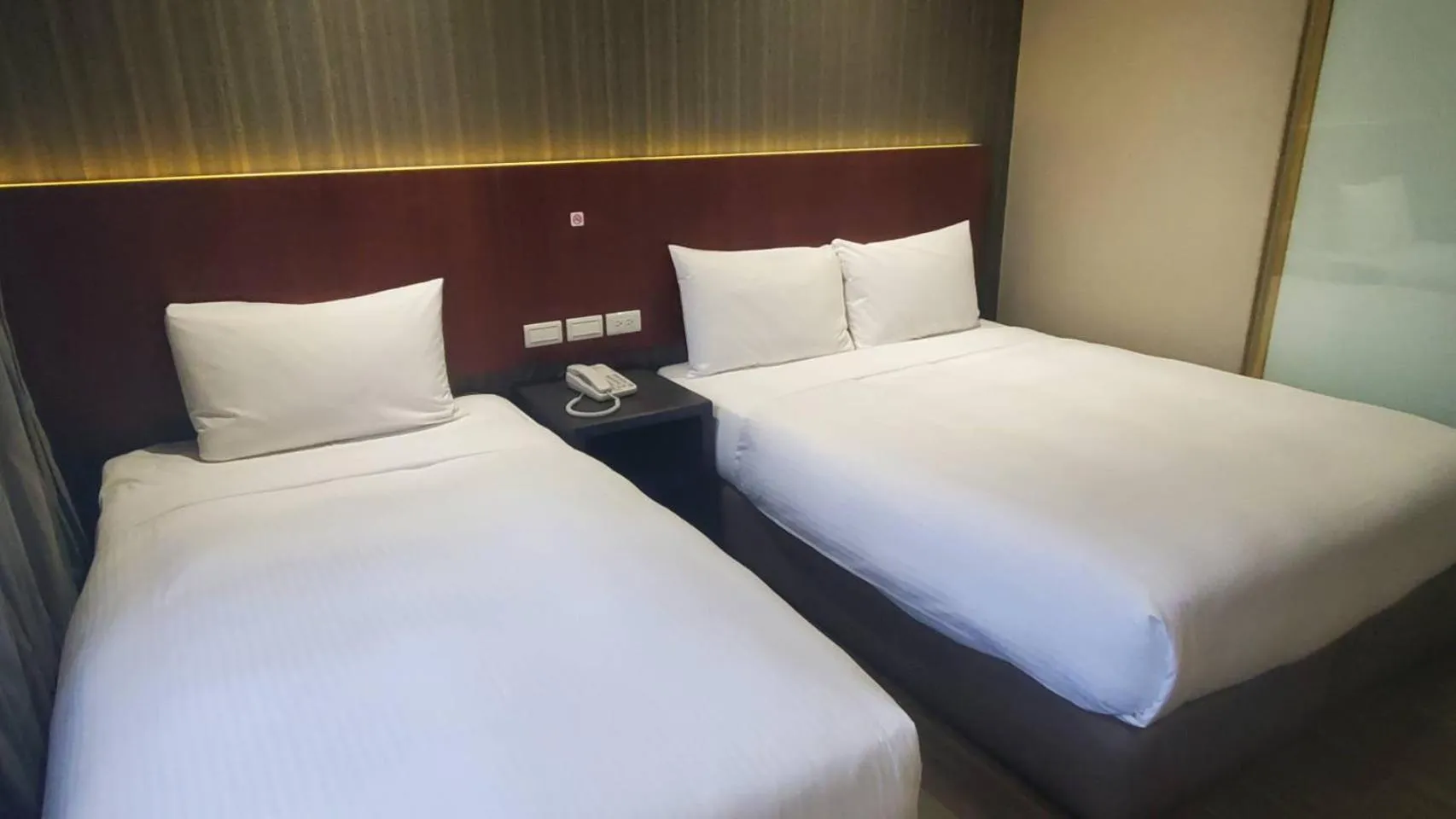 Bed in KDM Hotel