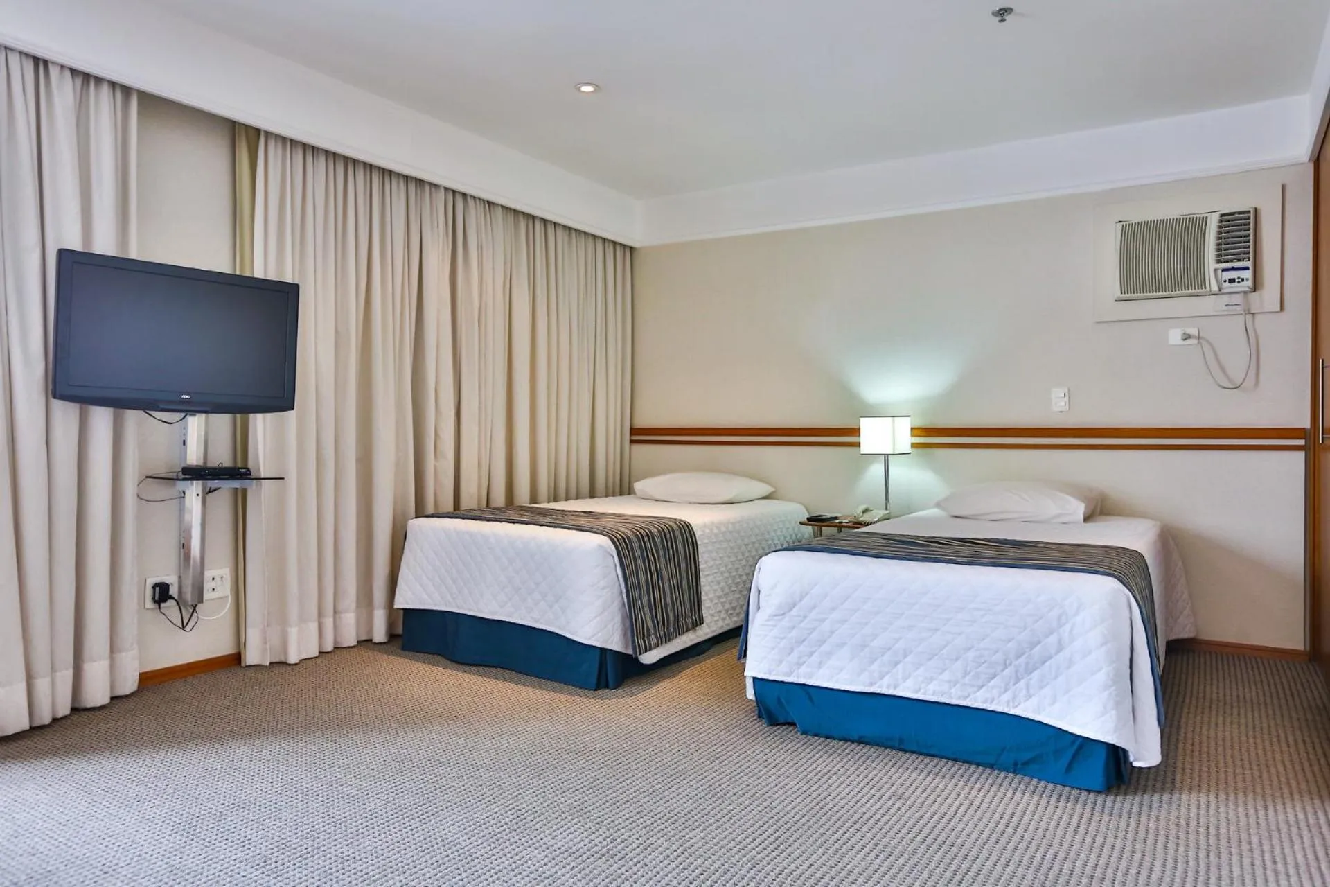 Bed in eSuites Sorocaba by Atlantica