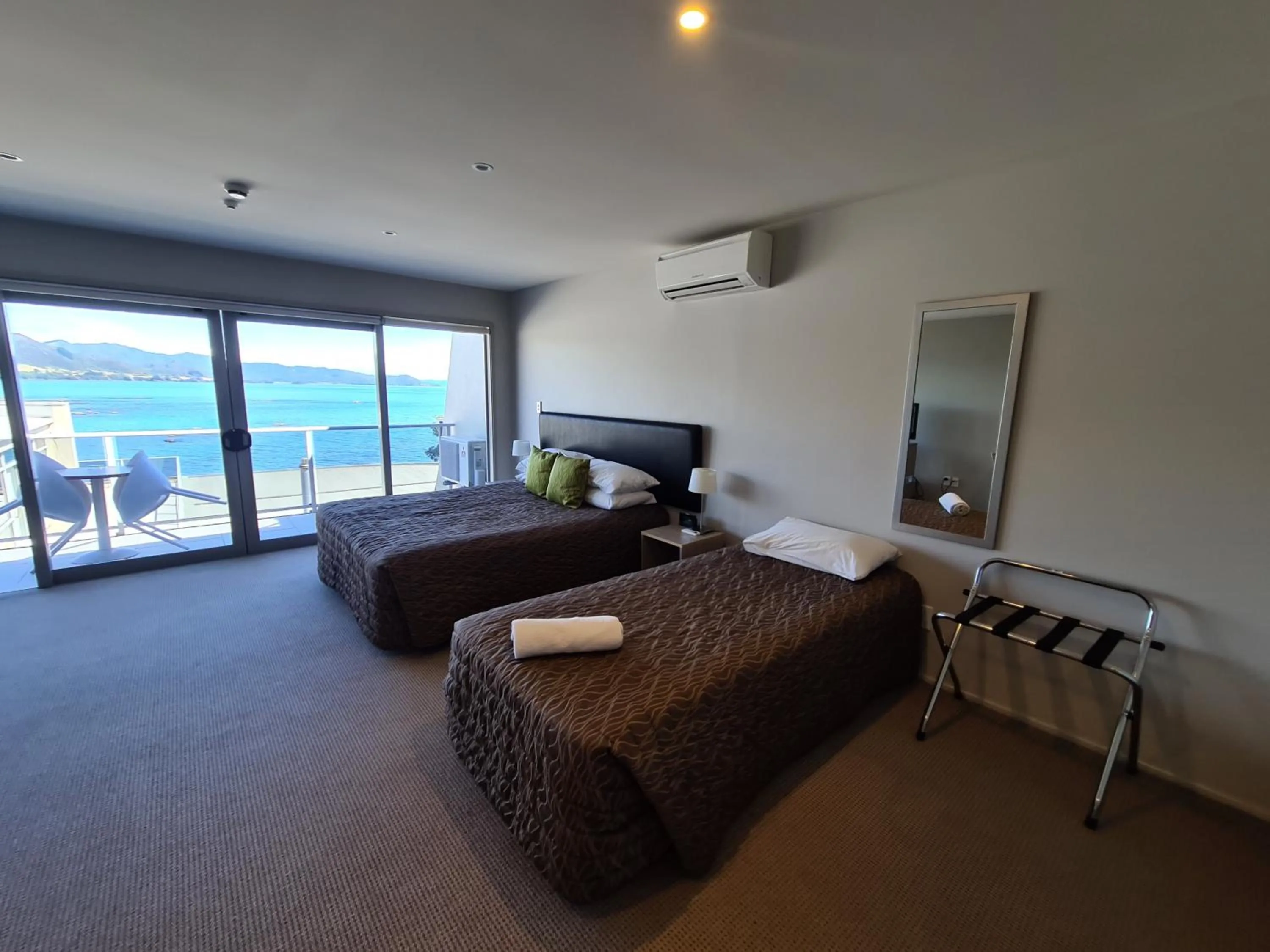 Balcony/Terrace, Bed in Te Kaha Beach Hotel