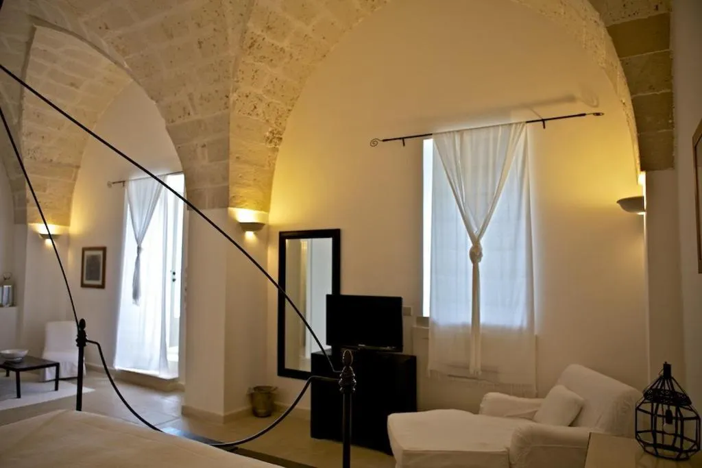 Photo of the whole room, Bed in Masseria Montelauro