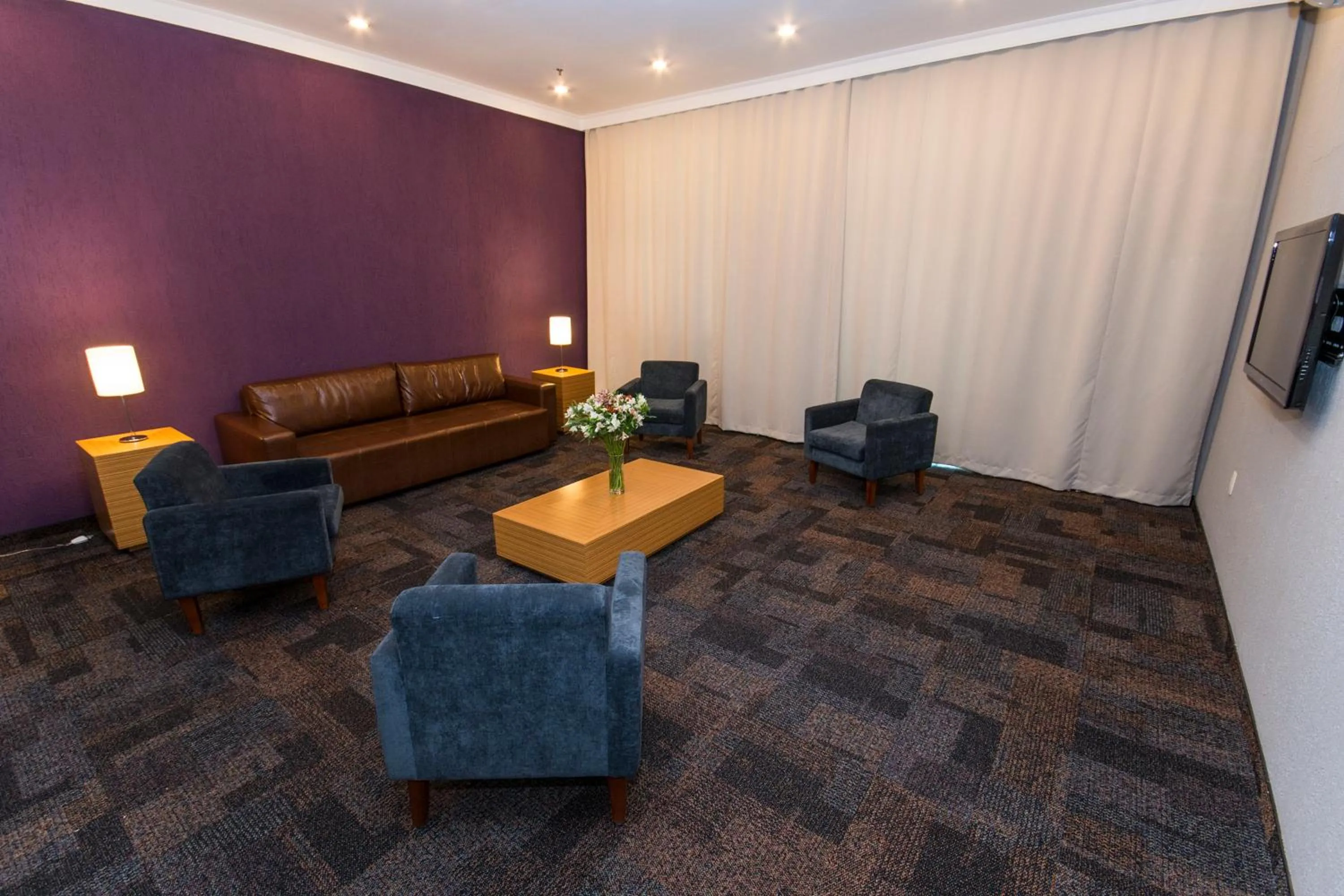 Communal lounge/ TV room in Transamerica Executive Perdizes