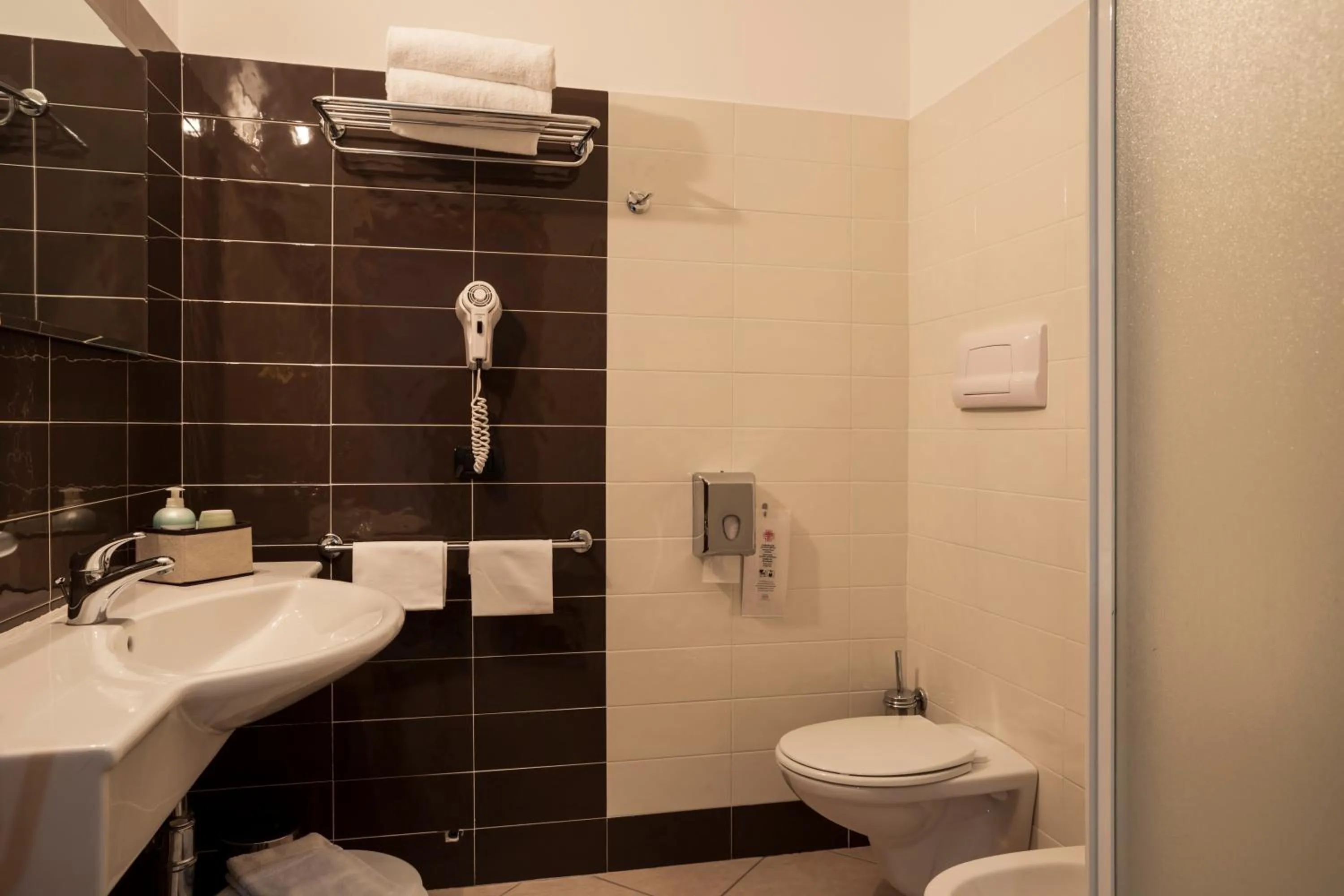 Shower in Manhattan Village Hotel