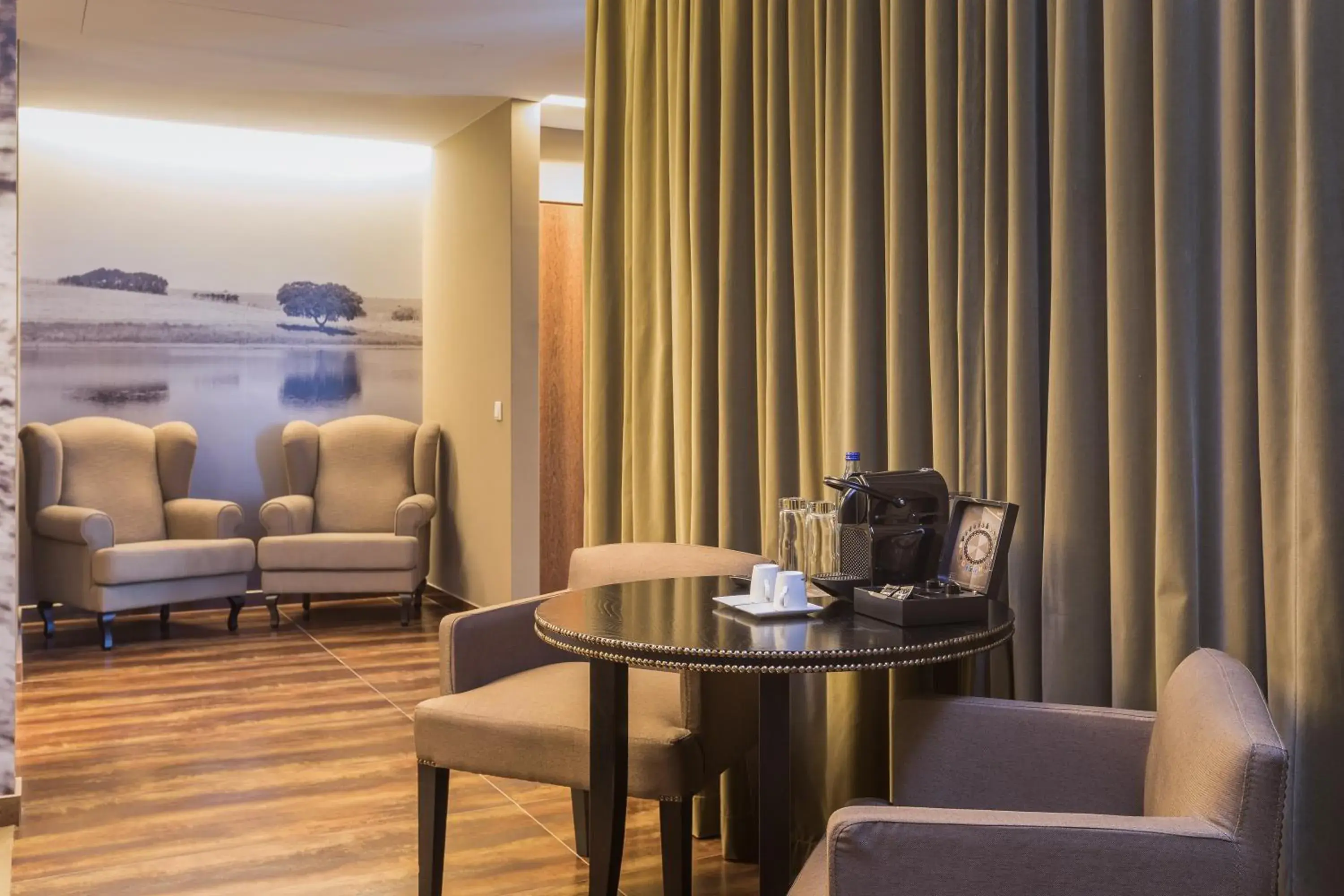 Living room in AP Lago Montargil - Conference & SPA Living room in AP Lago Montargil - Conference & SPA