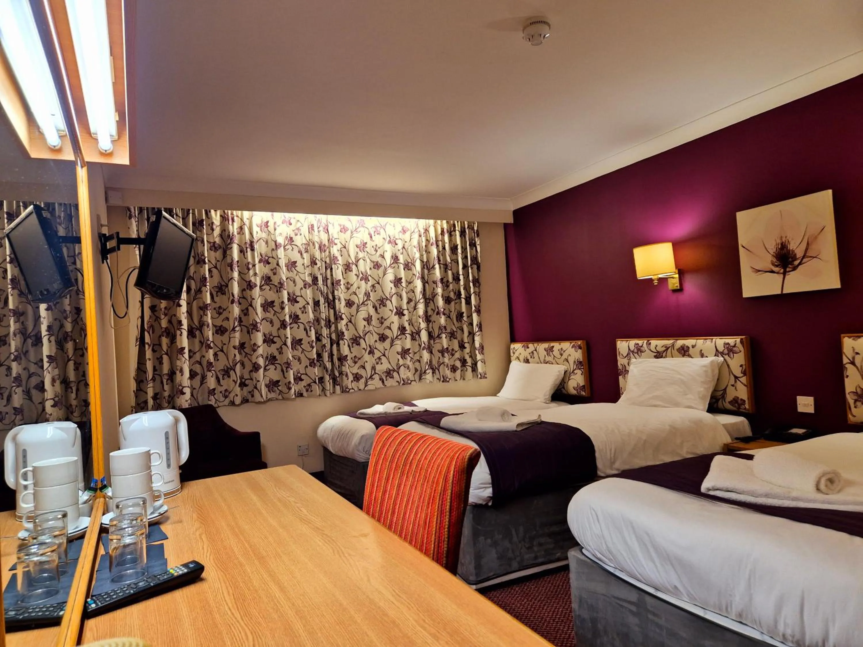 Bedroom in Supreme Inn Boston