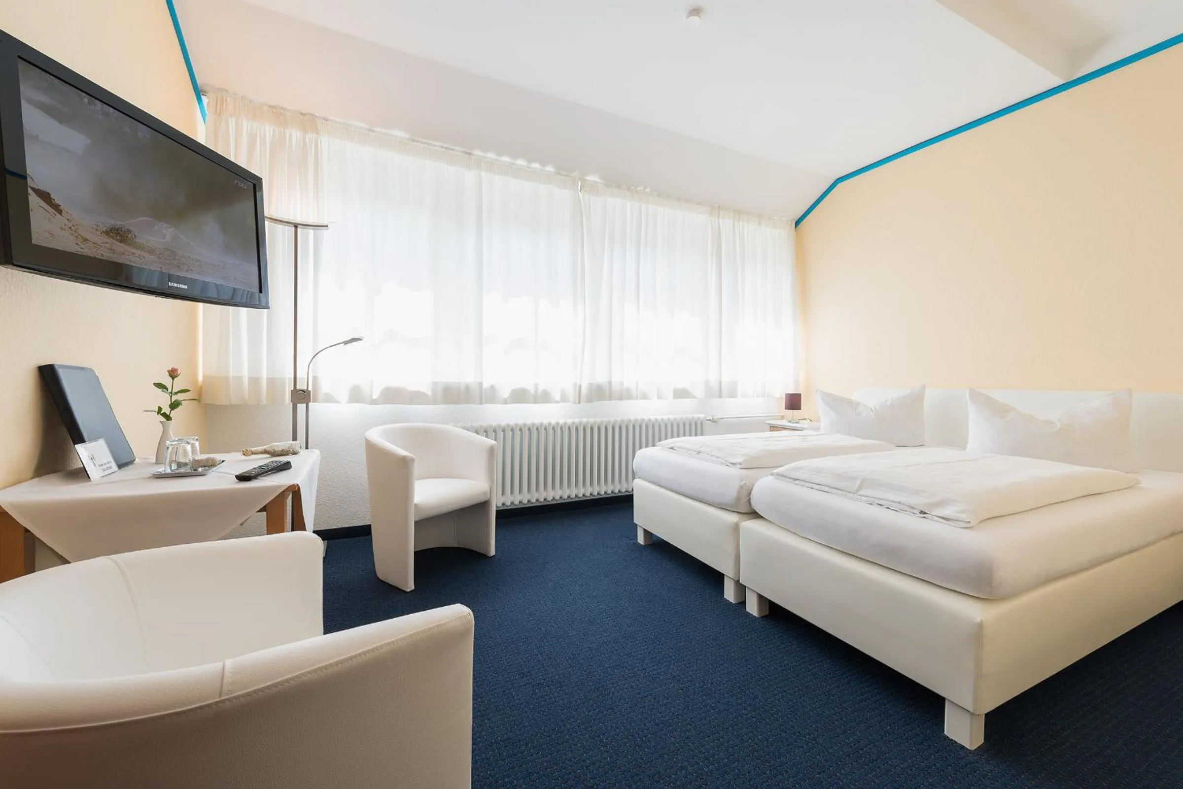 Photo of the whole room, Bed in Hotel am Wind