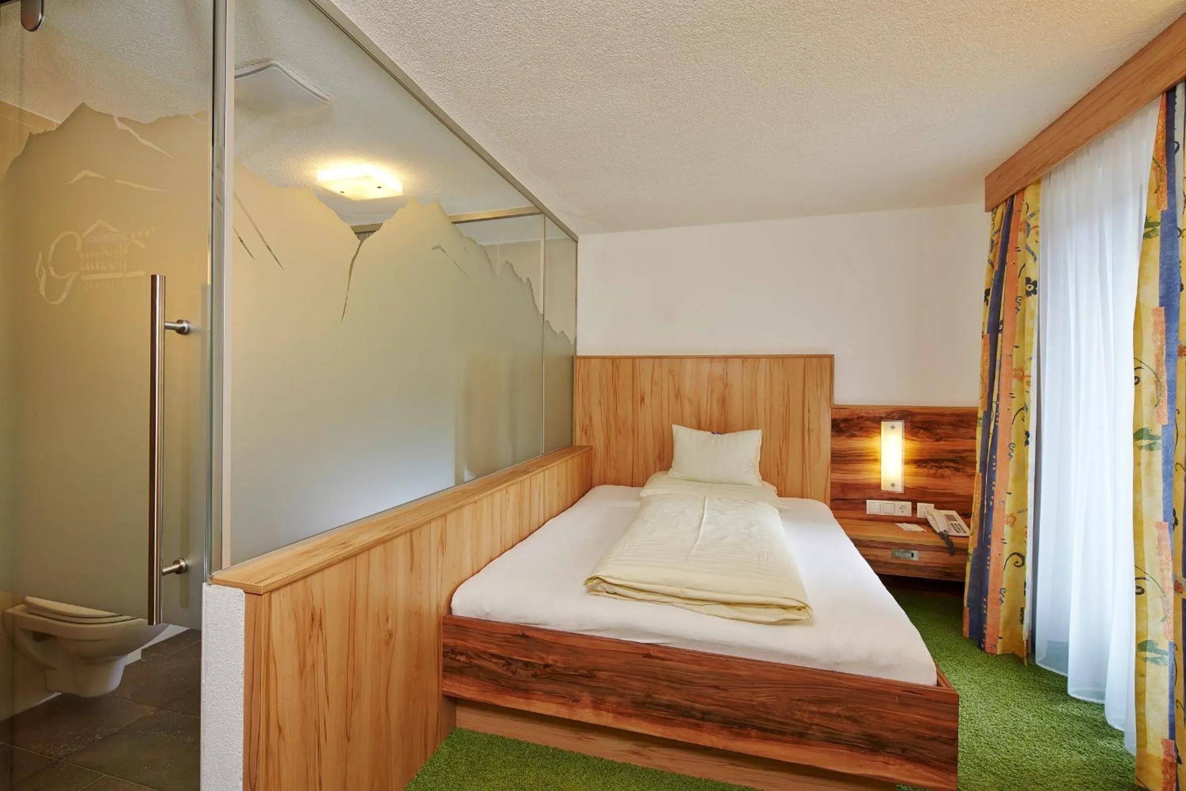 Bed in Hotel Gundolf