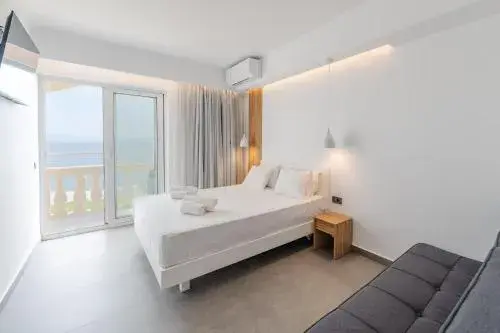 Deluxe Suite with Balcony and Pontikonisi island view in Pontikonisi Hotel & Suites-Adults Only Deluxe Suite with Balcony and Pontikonisi island view in Pontikonisi Hotel & Suites-Adults Only