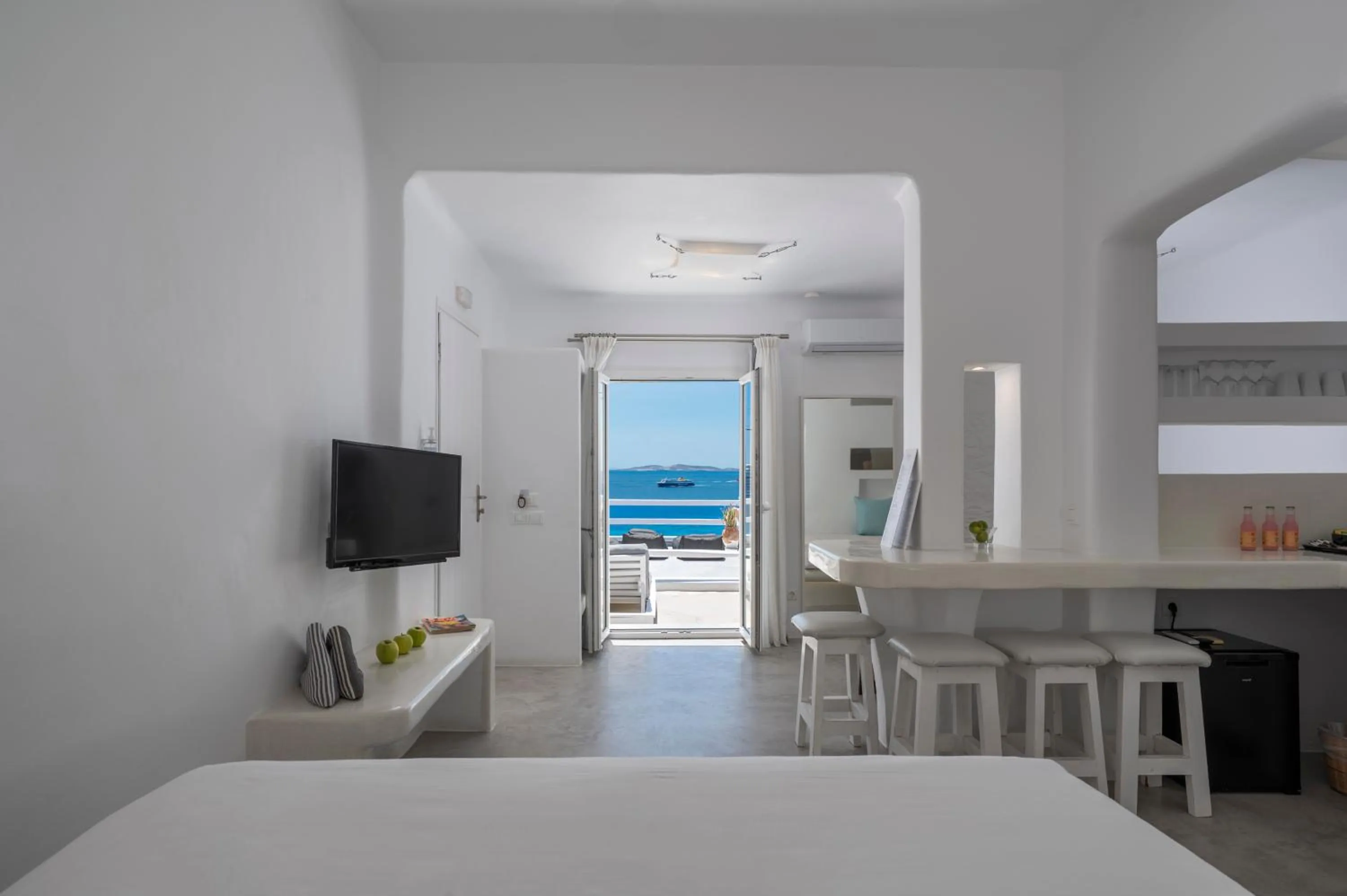 Bed in Flaskos Luxury Suites