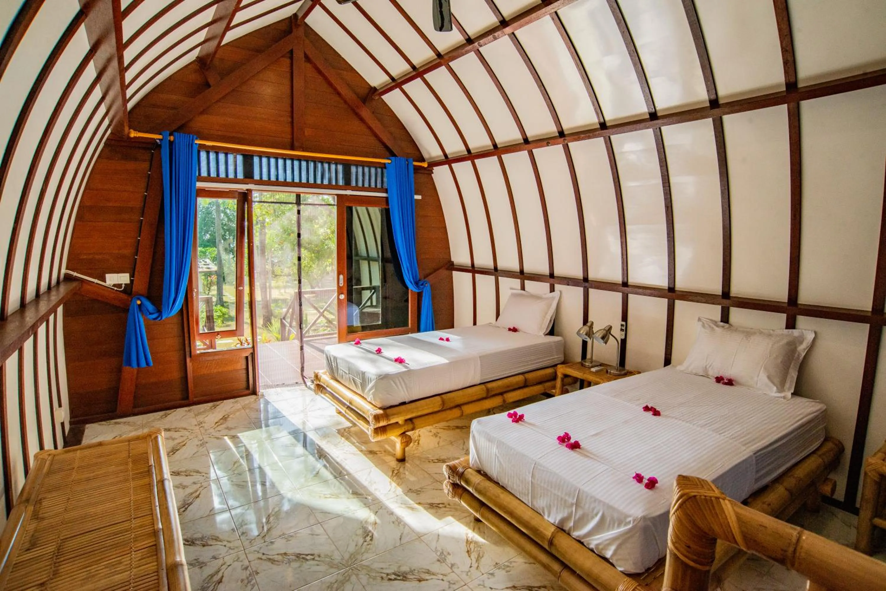Bed in The Papalagi Resort