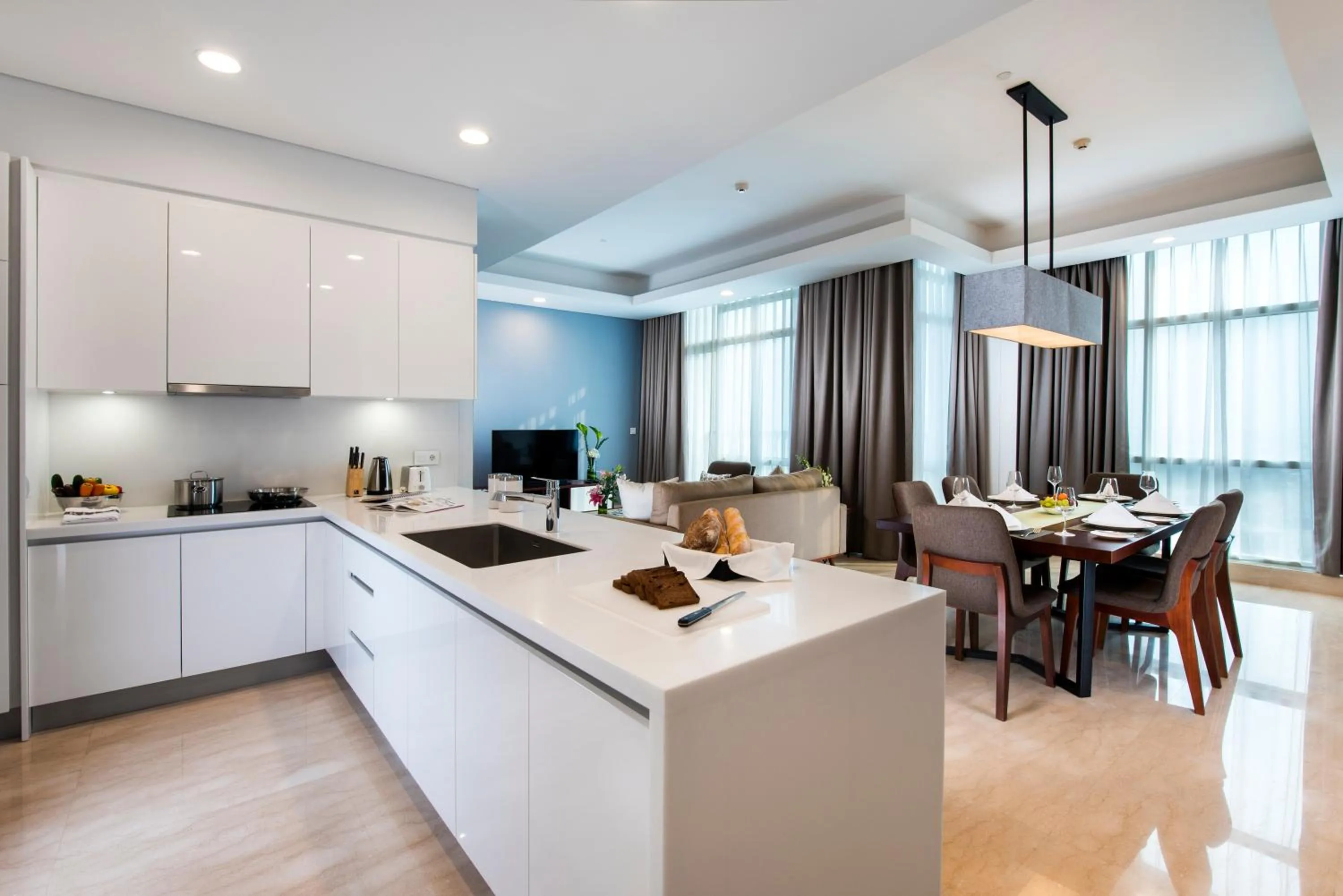 Kitchen or kitchenette in Oakwood Suites La Maison Jakarta