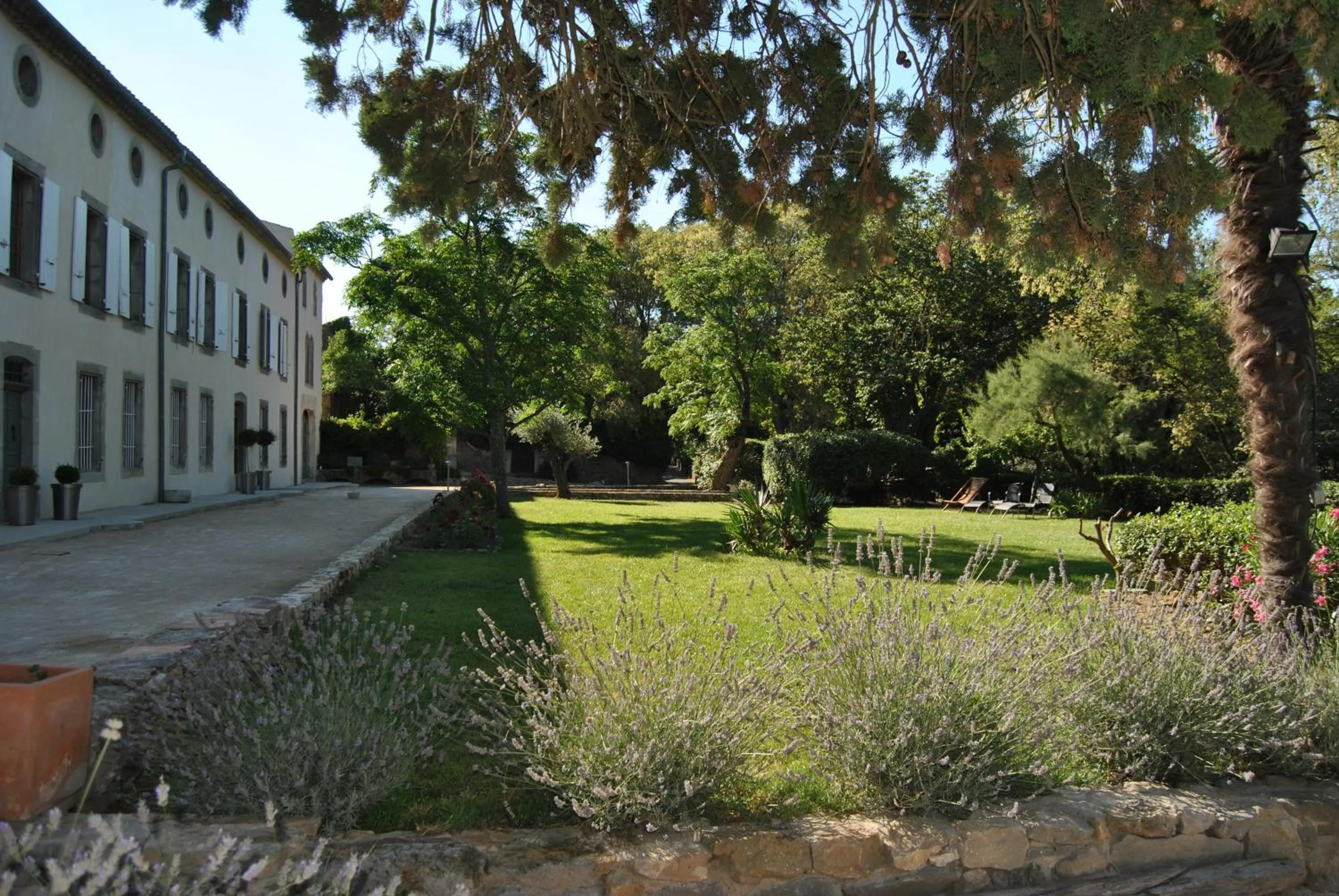 Garden in Logis Hôtel Château De Palaja