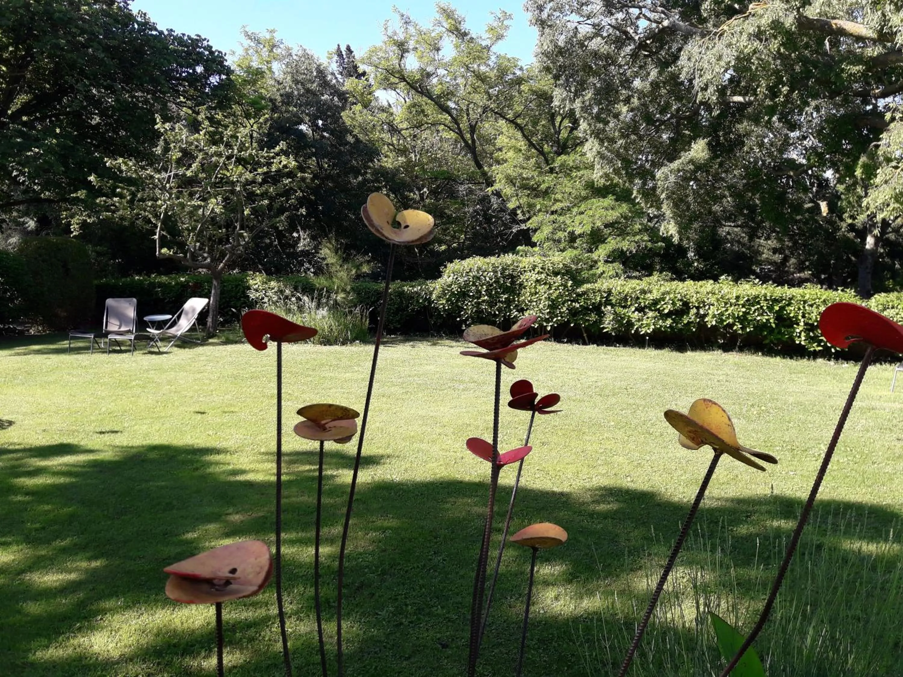 Garden in Logis Hôtel Château De Palaja