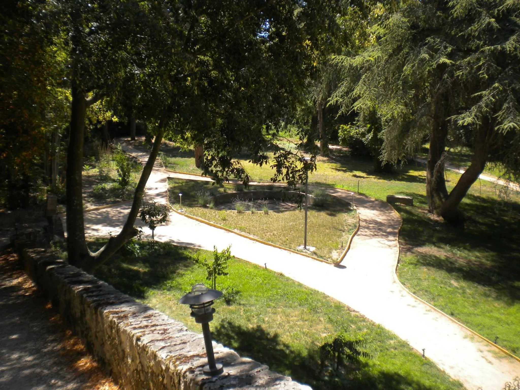 Garden in Logis Hôtel Château De Palaja