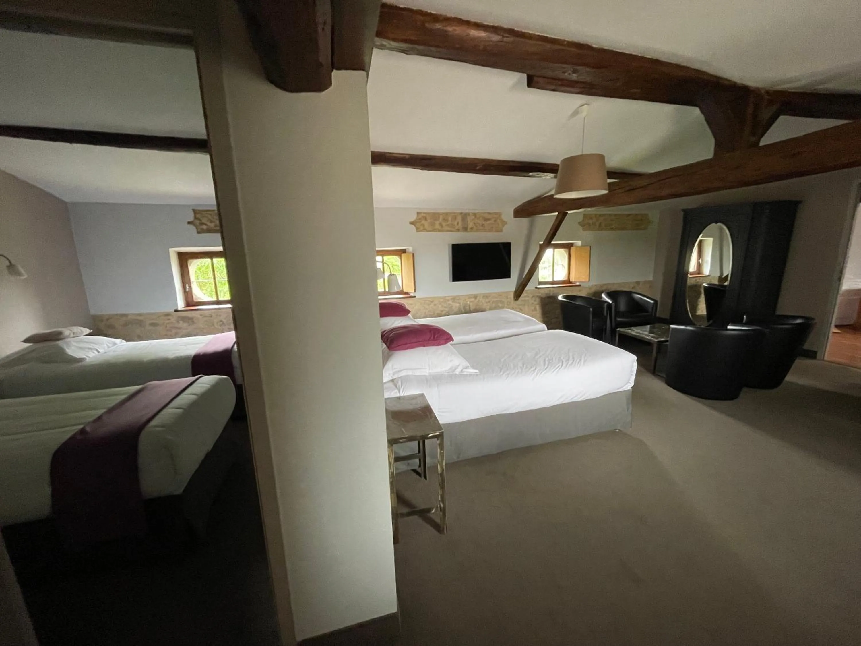 Bed in Logis Hôtel Château De Palaja