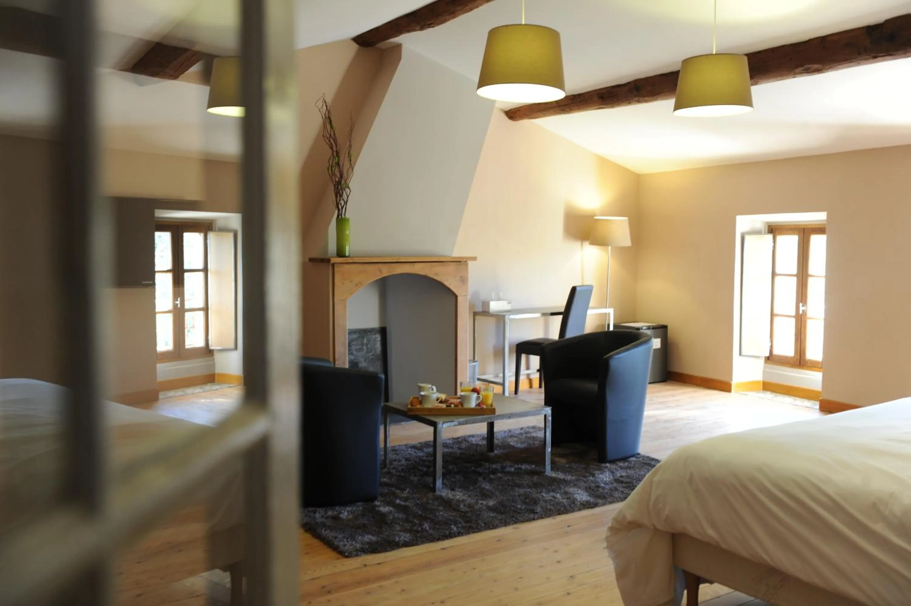 Bedroom in Logis Hôtel Château De Palaja