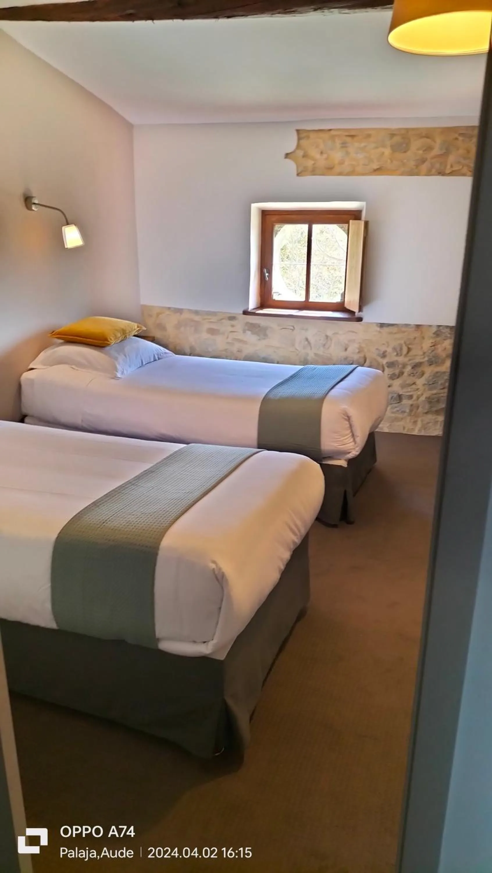 Bed in Logis Hôtel Château De Palaja