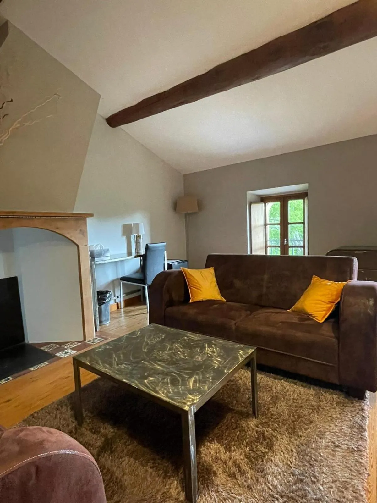 Seating area in Logis Hôtel Château De Palaja