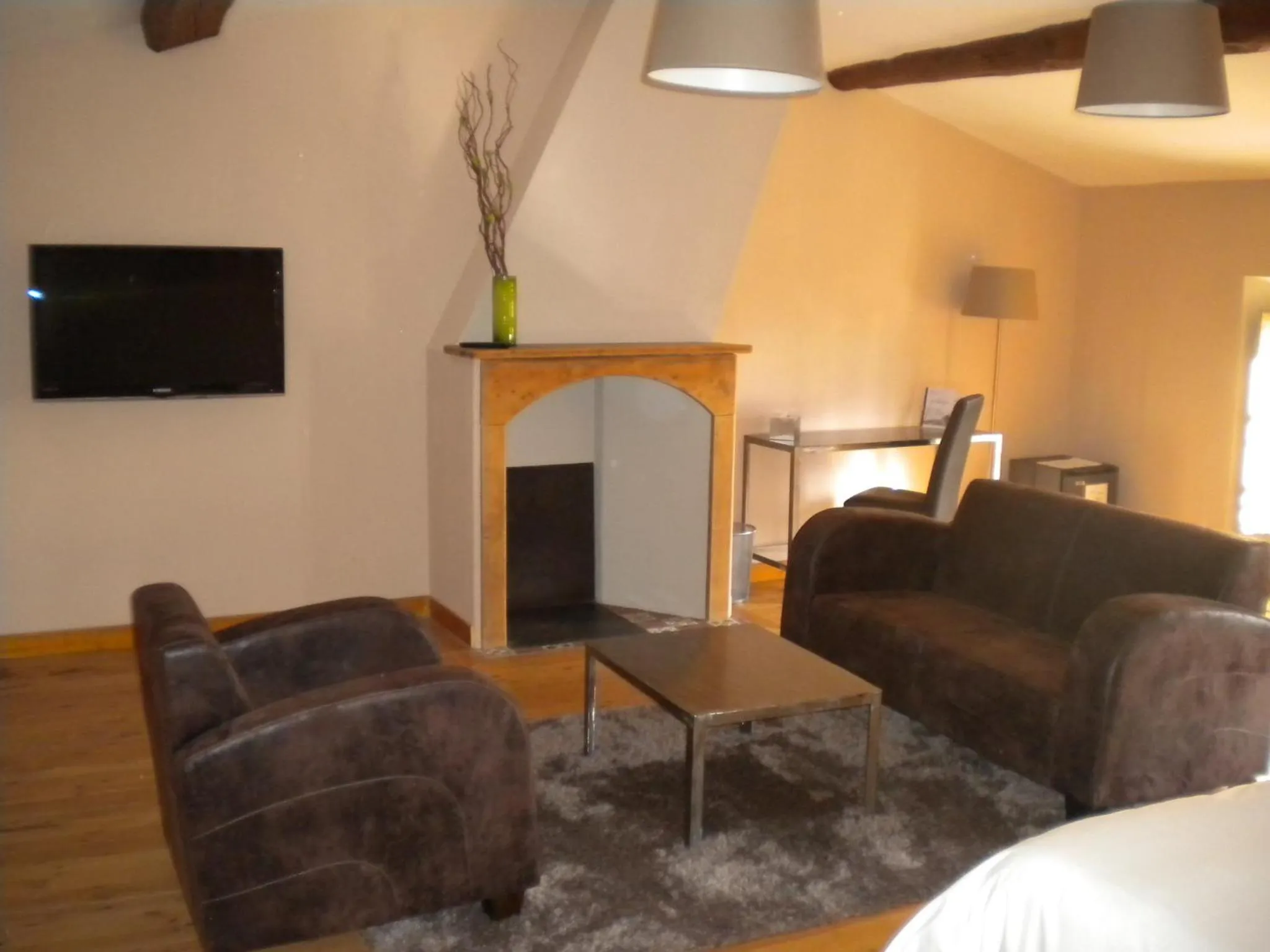 Bedroom in Logis Hôtel Château De Palaja