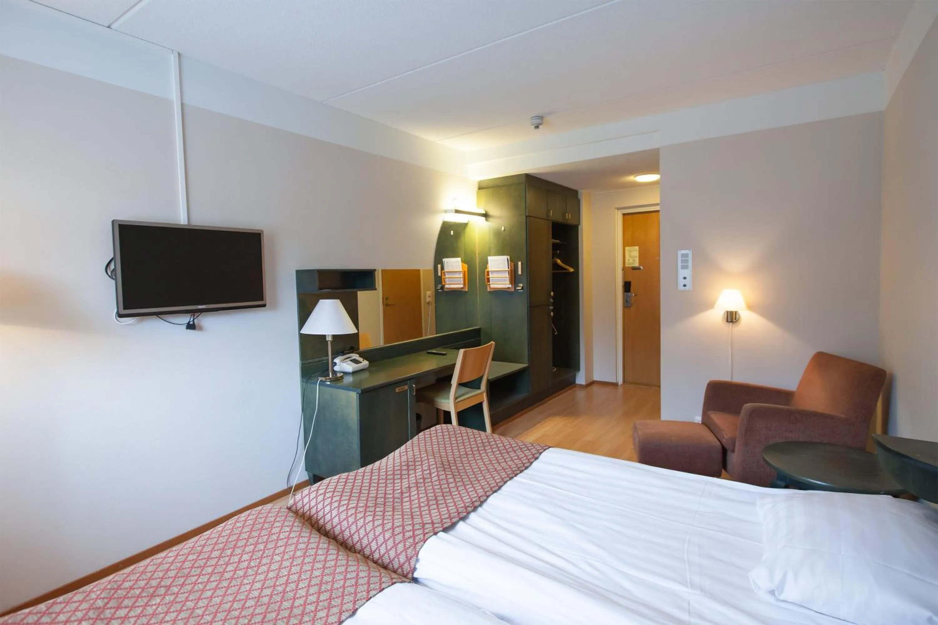 Bed in Hotel Kajanus