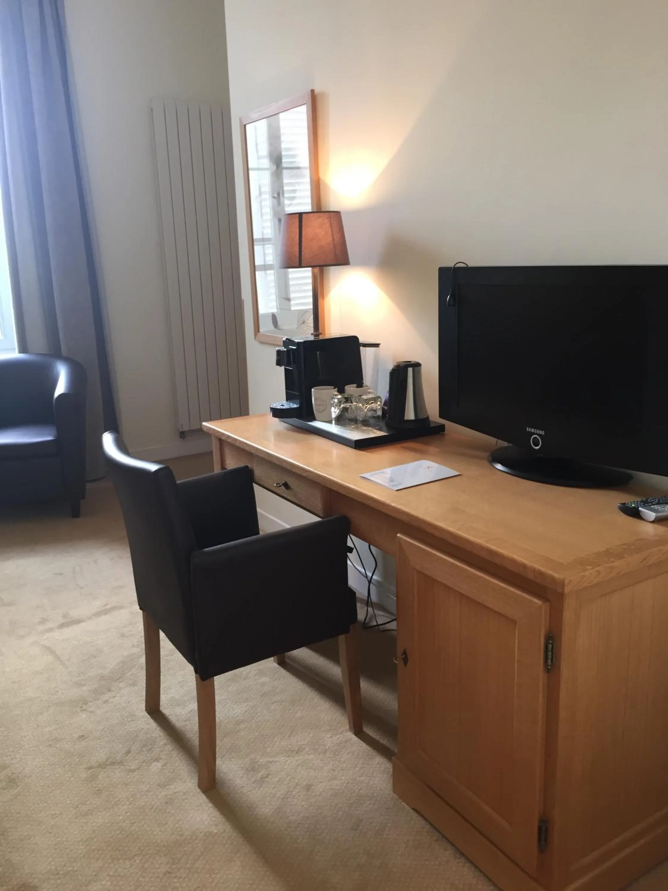 Seating area in Hôtel Saint-Laurent, The Originals Relais