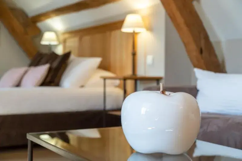 Bed in Hôtel Saint-Laurent, The Originals Relais Bed in Hôtel Saint-Laurent, The Originals Relais