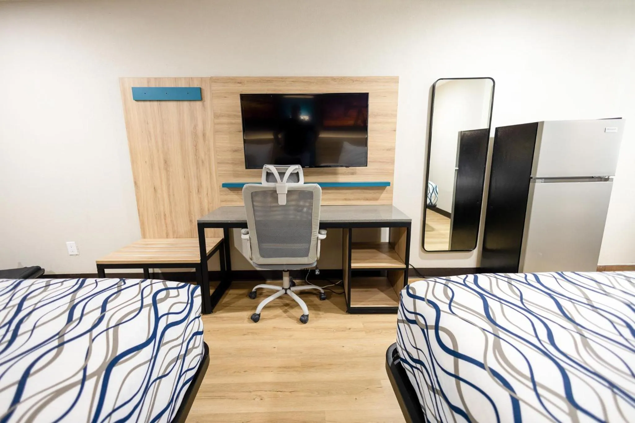 Bed in West Texas Inn & Suites with Kitchenette