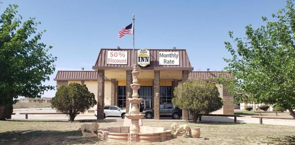 Property building in West Texas Inn & Suites with Kitchenette
