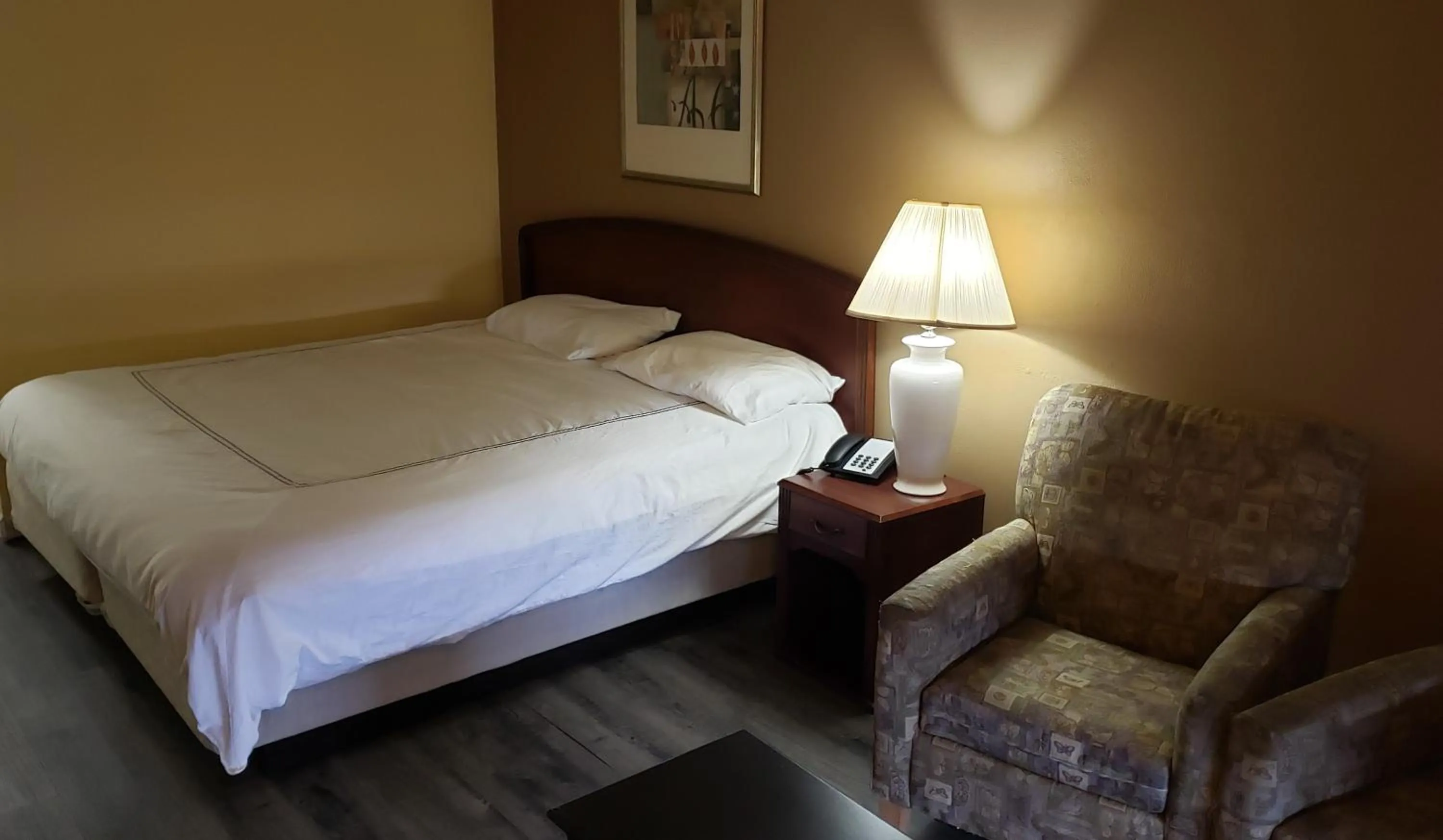 Bed in West Texas Inn & Suites with Kitchenette