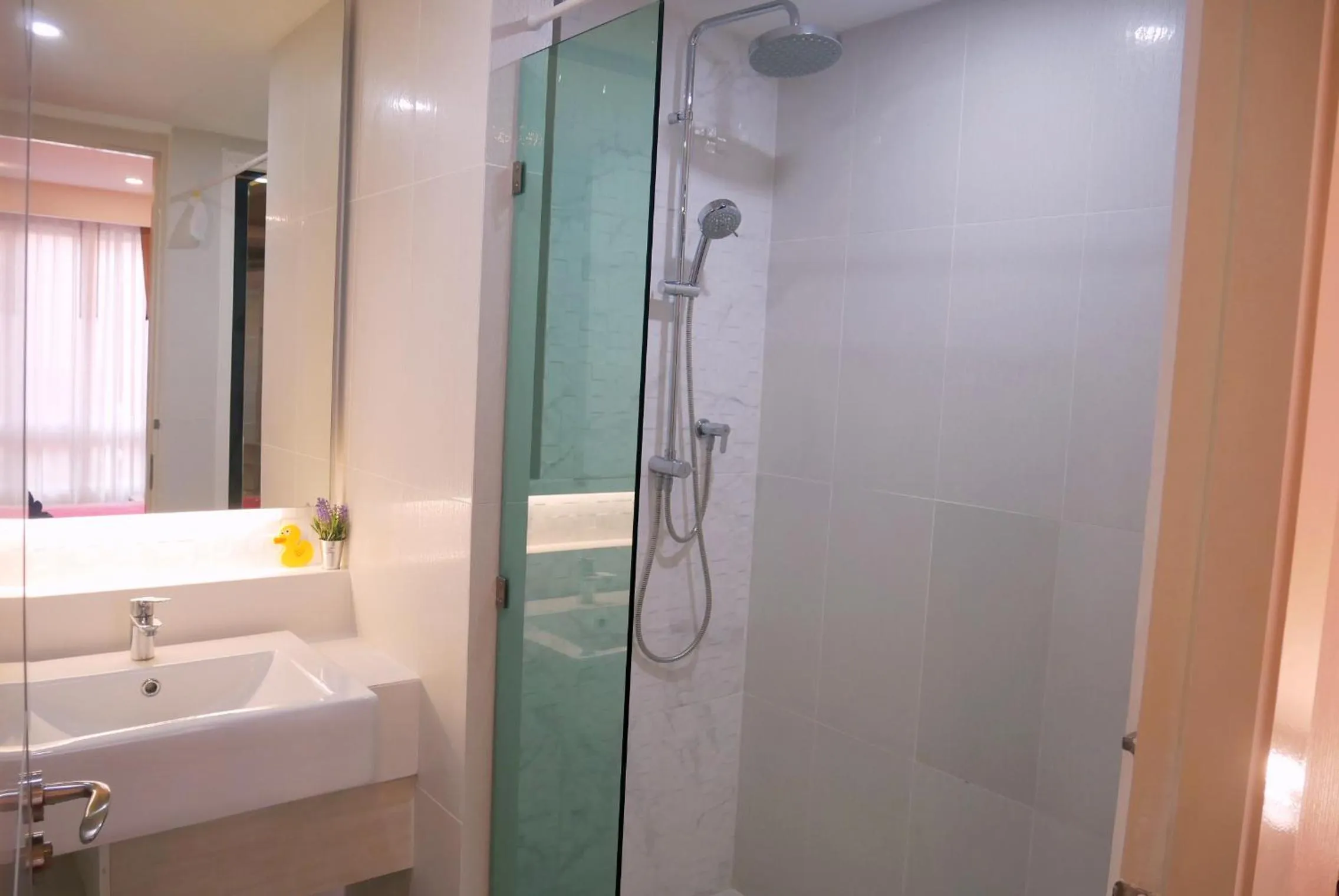 Bathroom in Seven Seas Resort Pattaya & Sofa bed