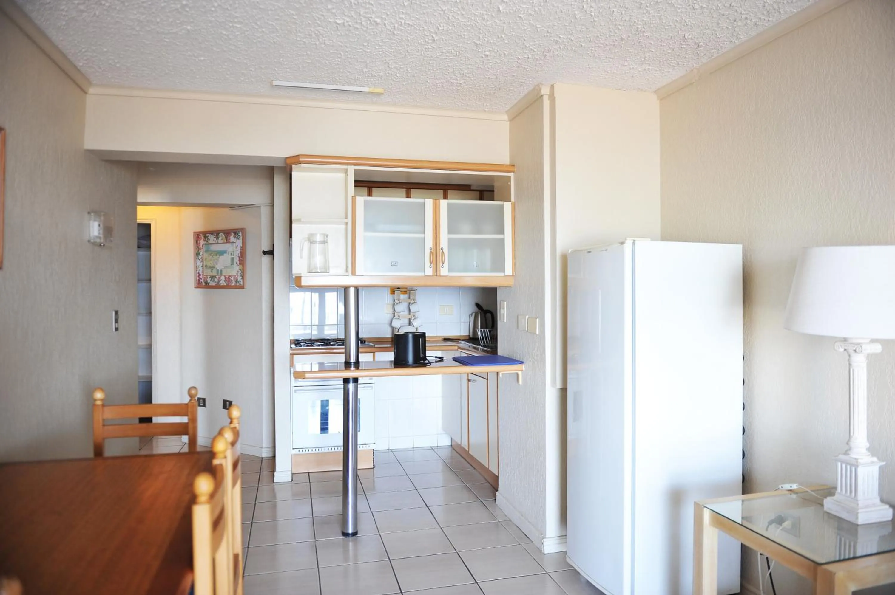 Kitchen or kitchenette in MR Mar Suites (ex Neruda Mar Suites)
