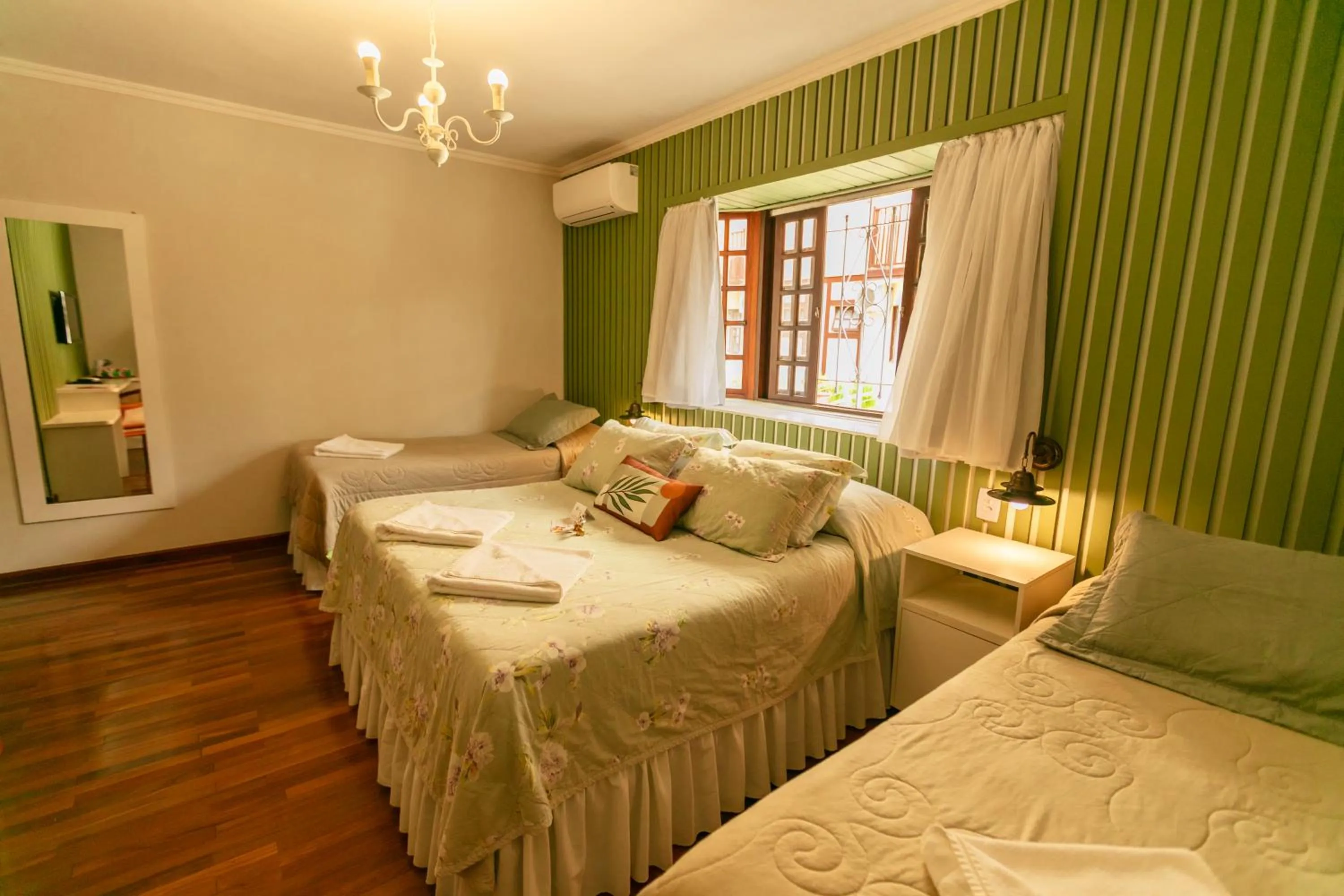 Bed in Pousada das Hortênsias