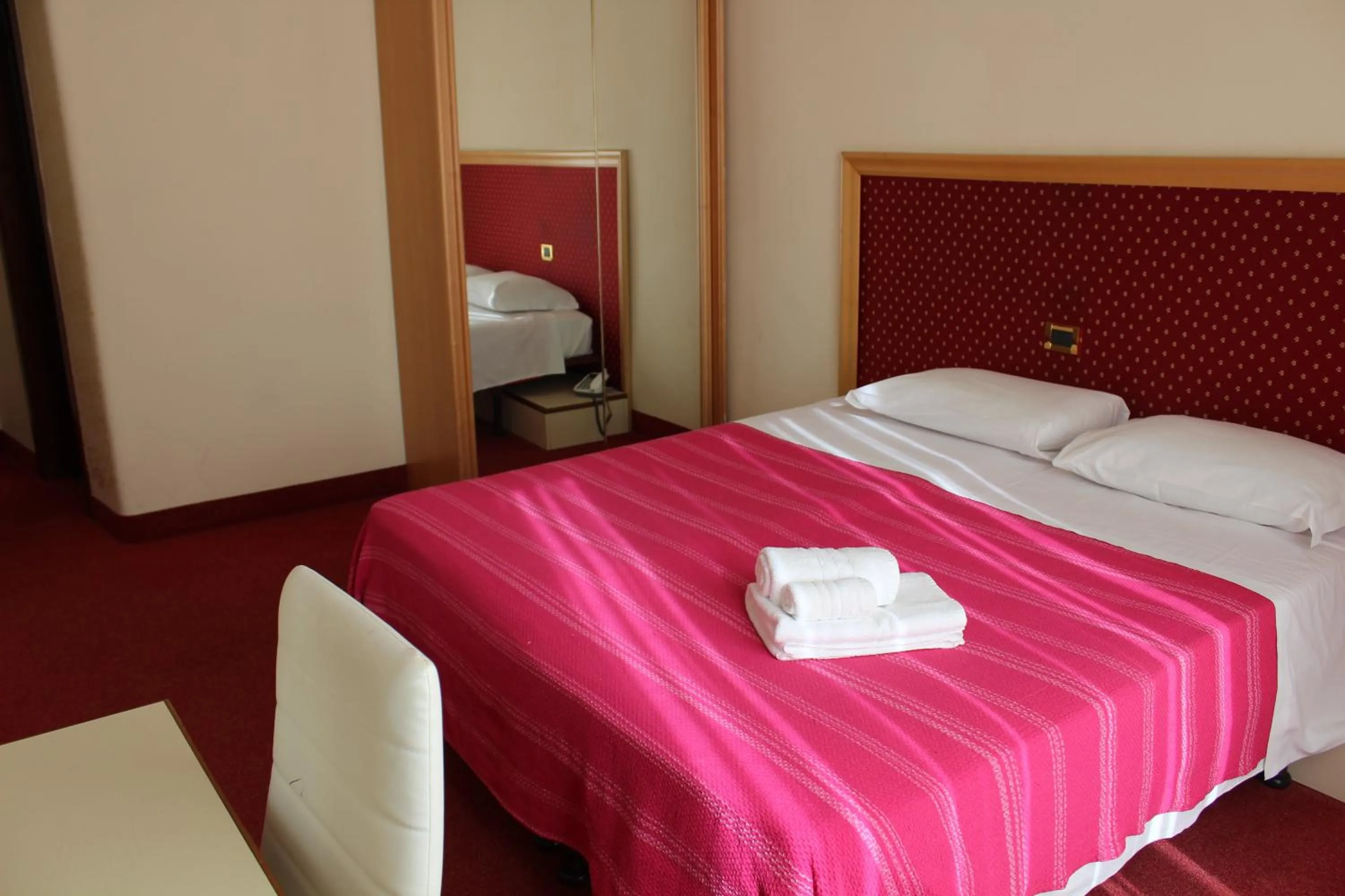 Bed in Hotel Palace Masoanri's