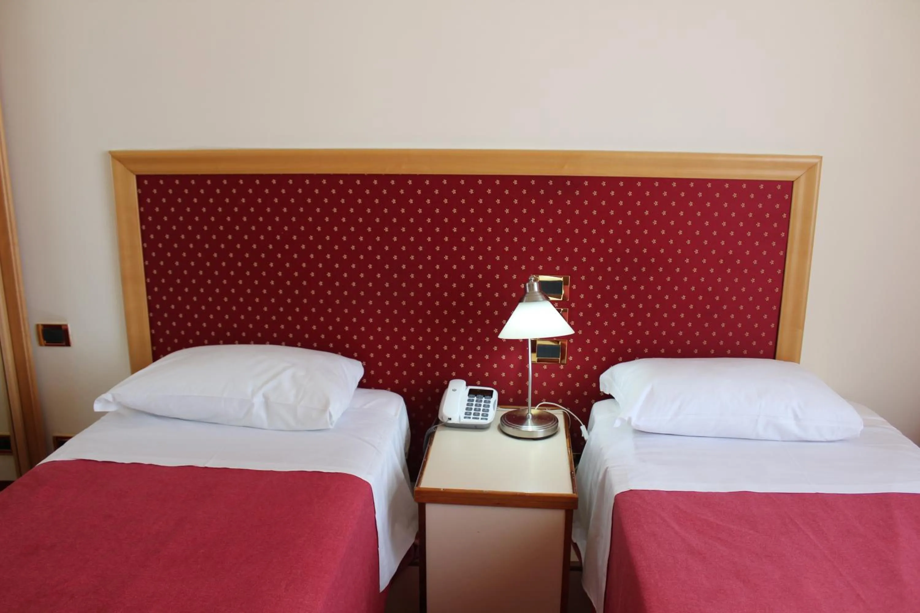 Bed in Hotel Palace Masoanri's