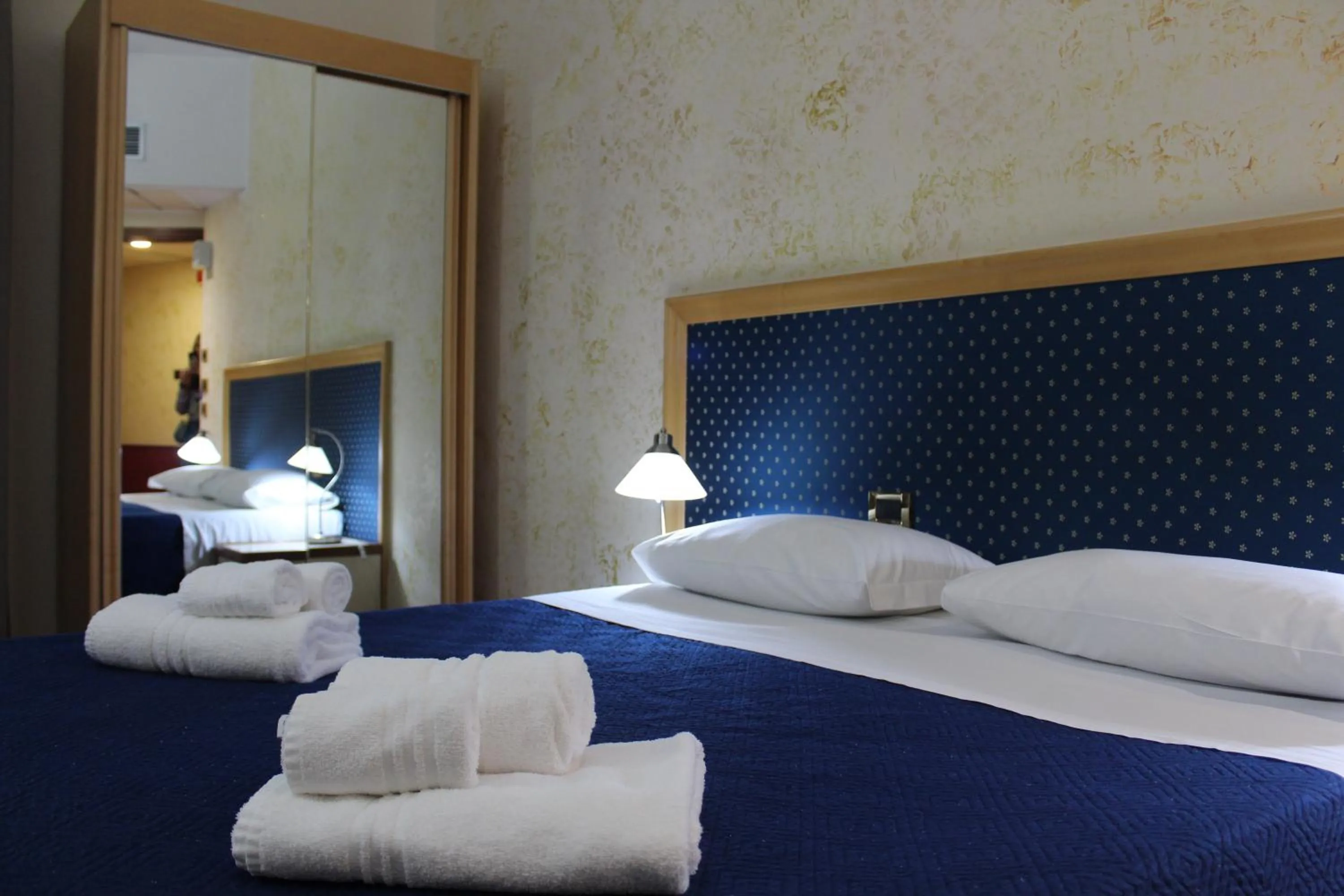 Bed in Hotel Palace Masoanri's