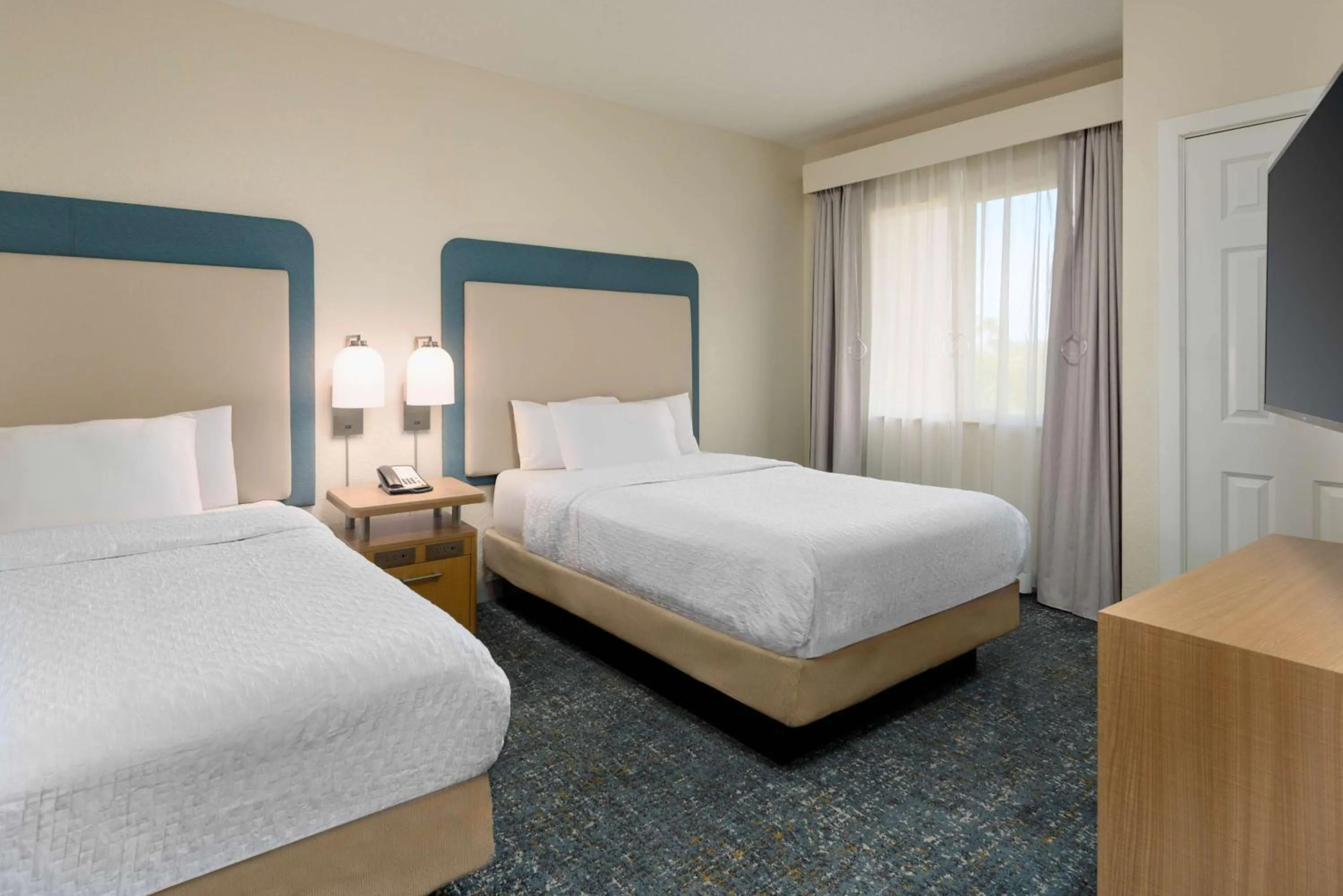 Bed in Homewood Suites by Hilton Bonita Springs, FL