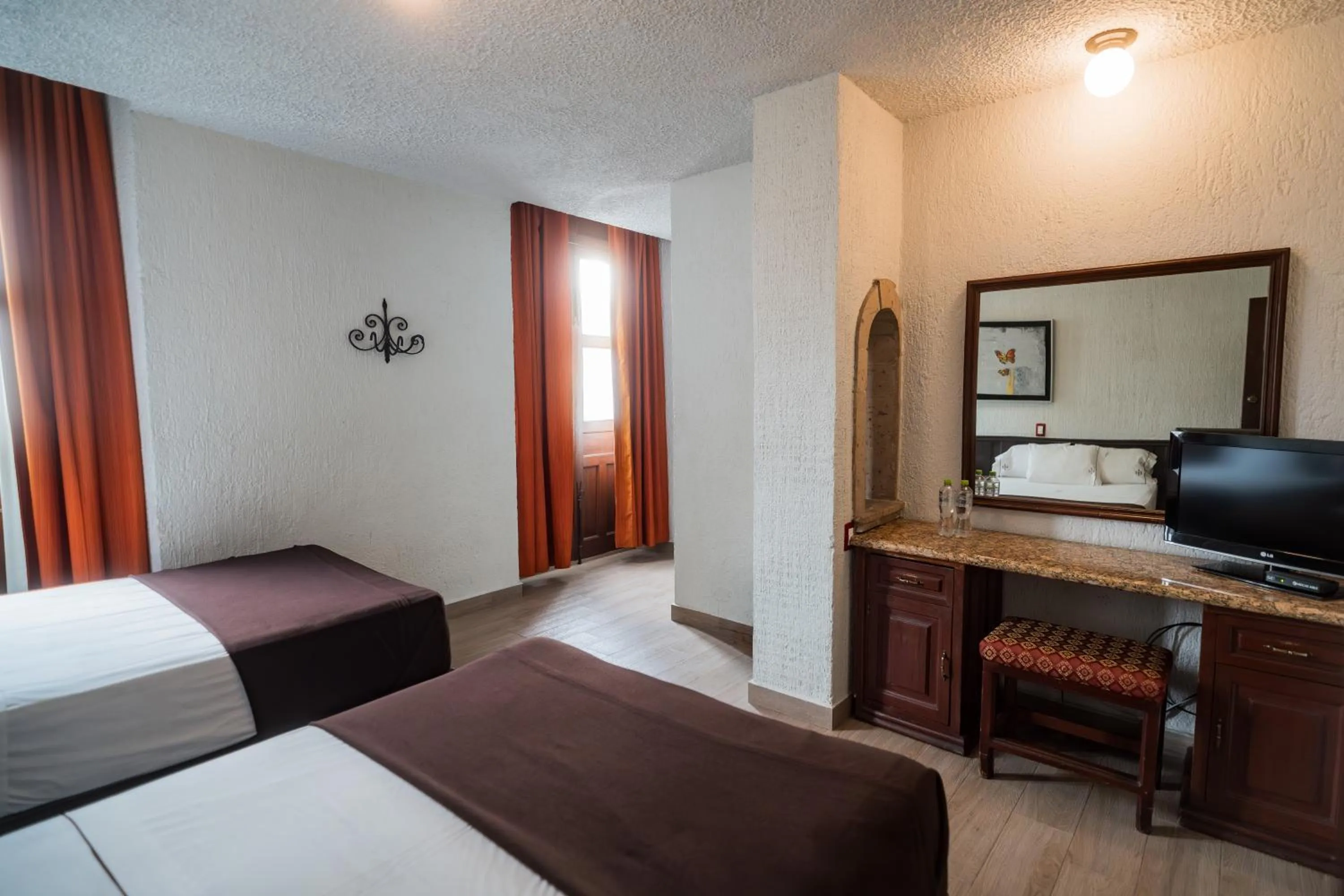 Bed in Hotel Don Quijote Plaza - Guadalajara Centro Historico