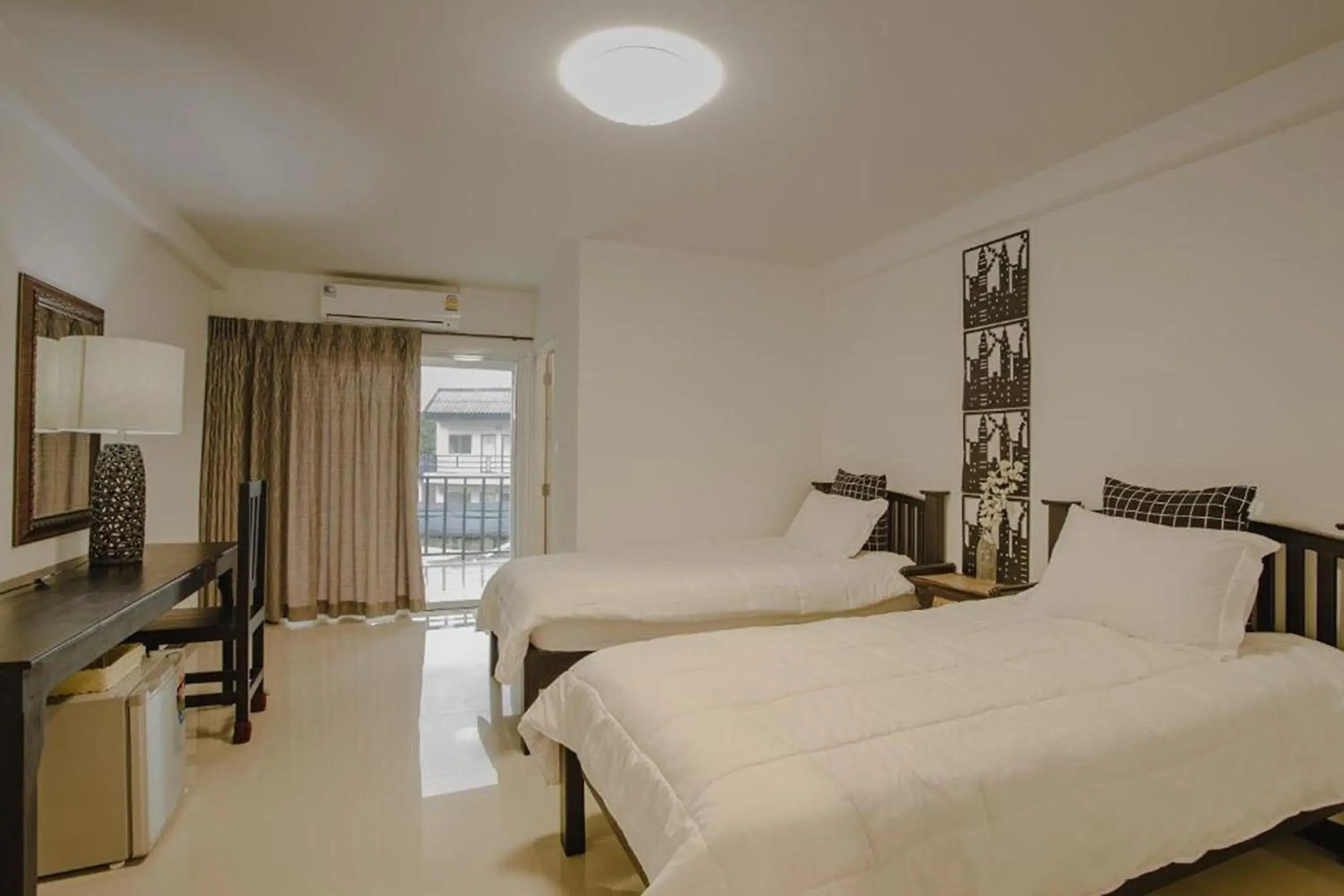 Deluxe Twin Room in Banjan Stay Deluxe Twin Room in Banjan Stay