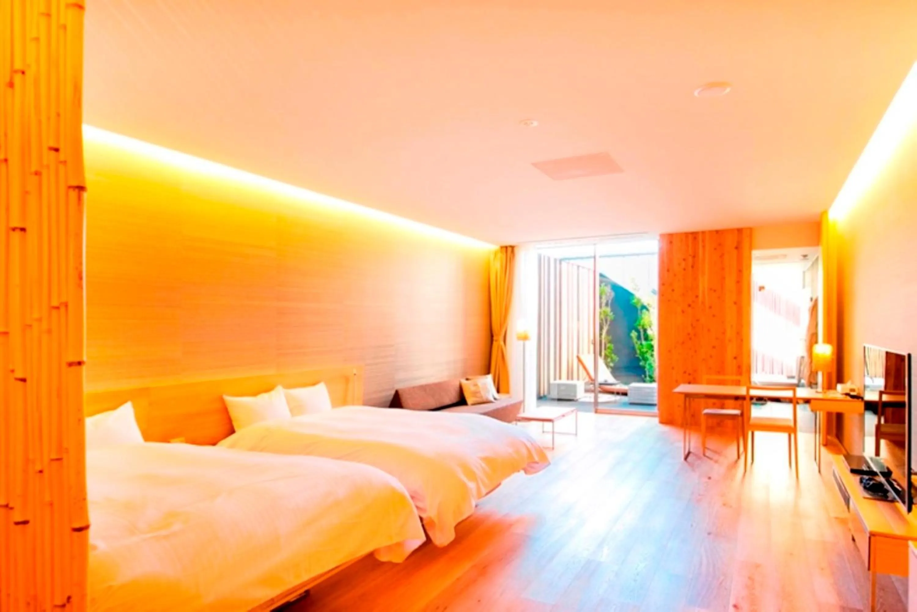 Bed in Garden Terrace Miyazaki Hotels And Resort