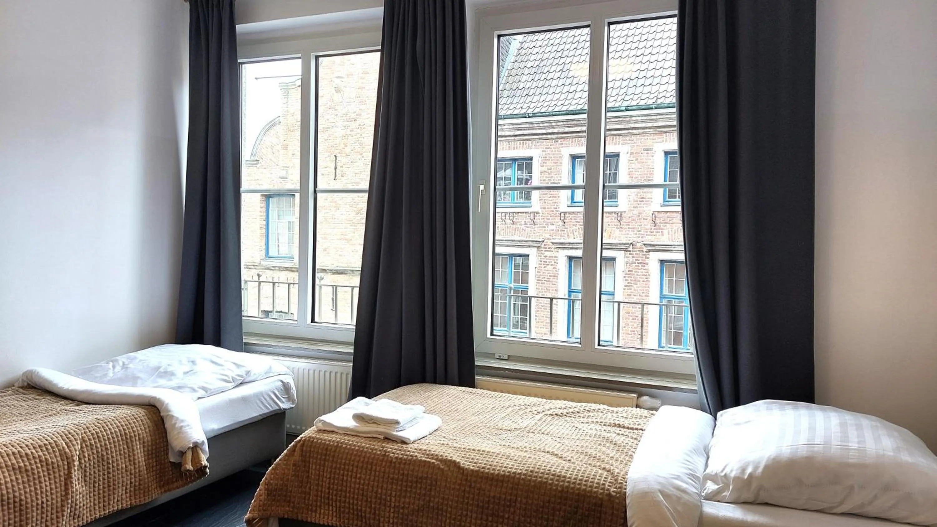 Bed in Old Town Apartments