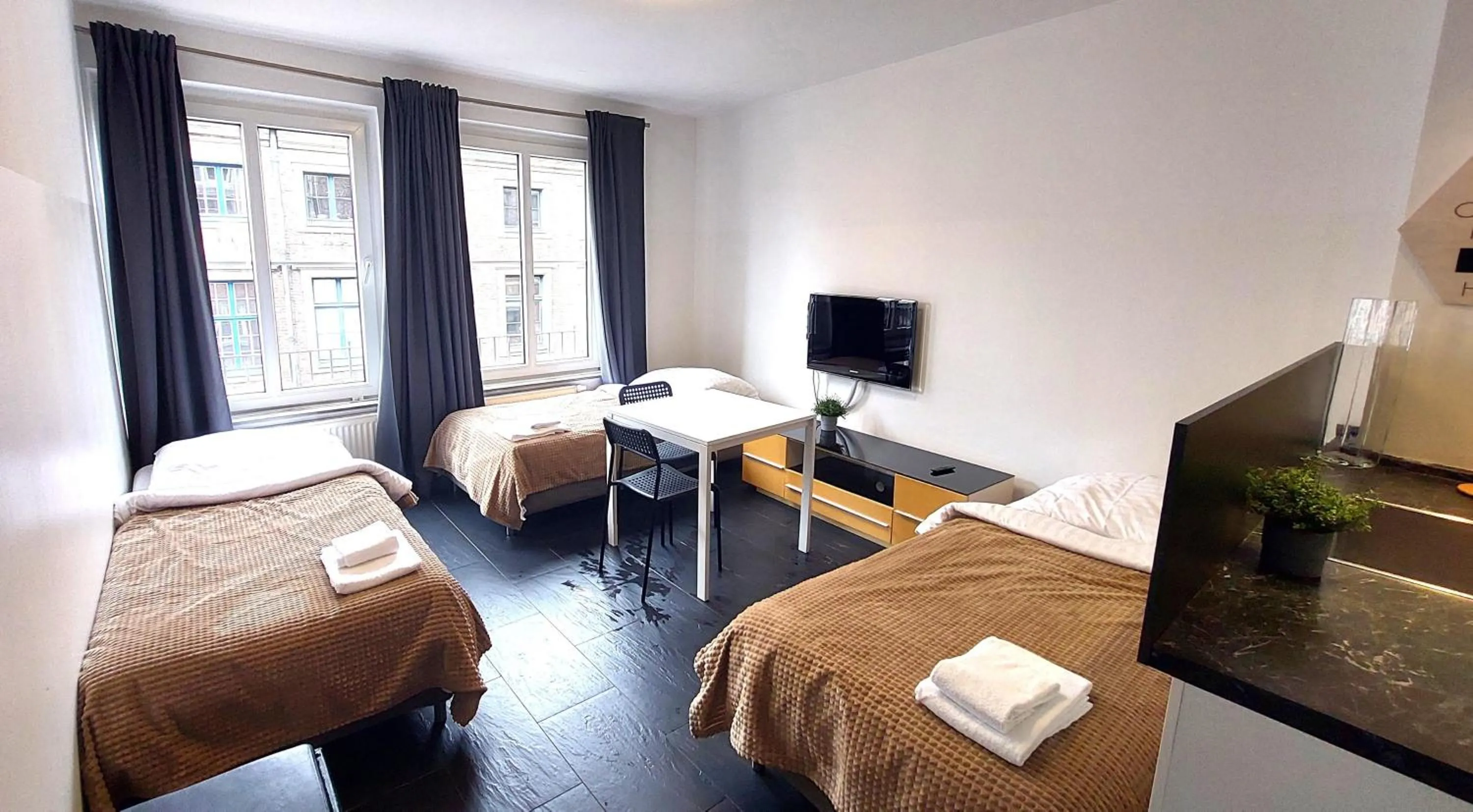 Bed in Old Town Apartments