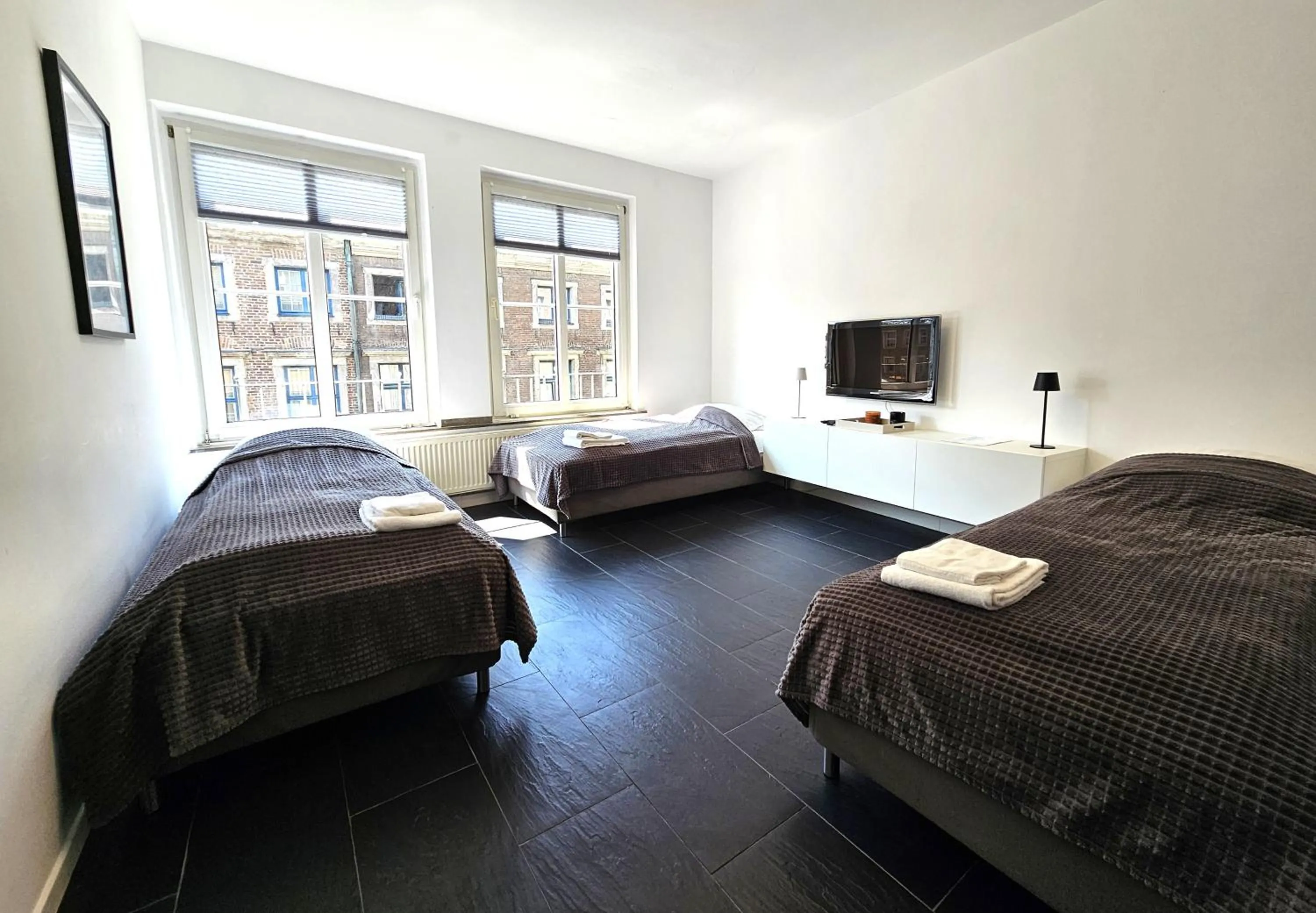 Bed in Old Town Apartments