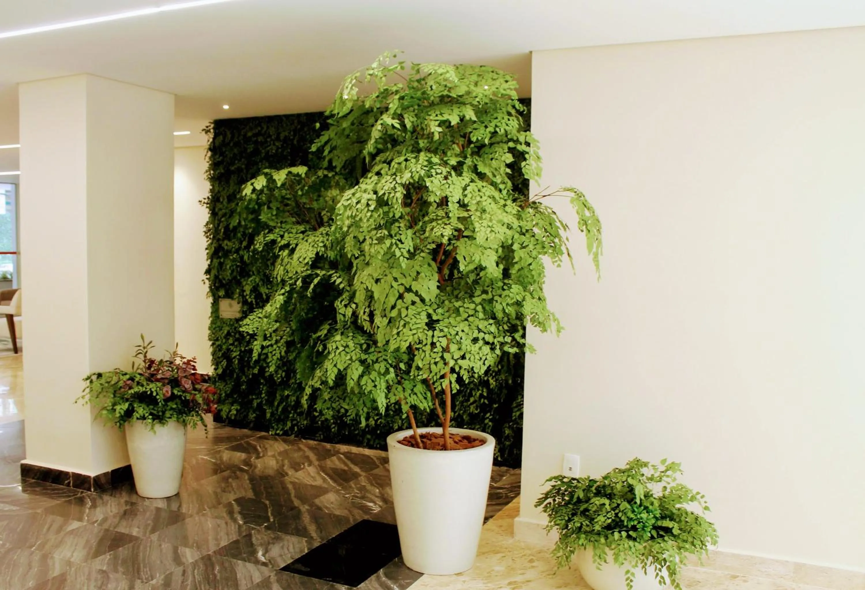 Lobby or reception in La Residence Itaim