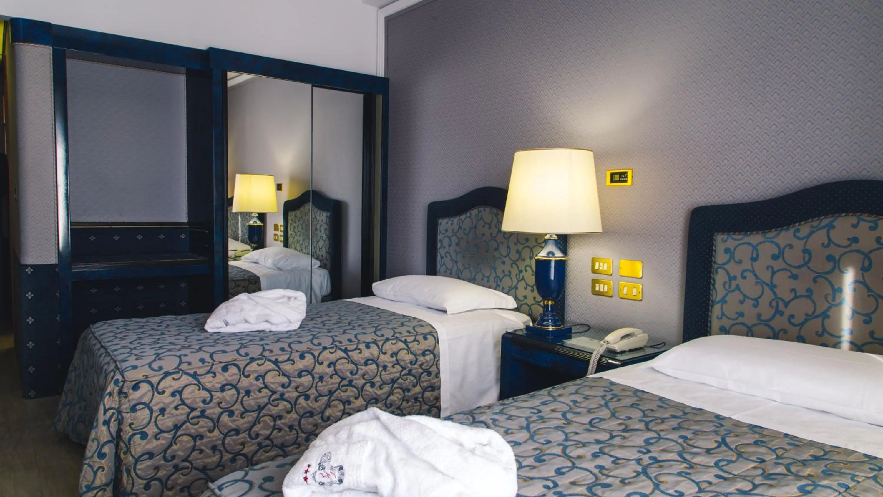 Bed in Grand Hotel Excelsior