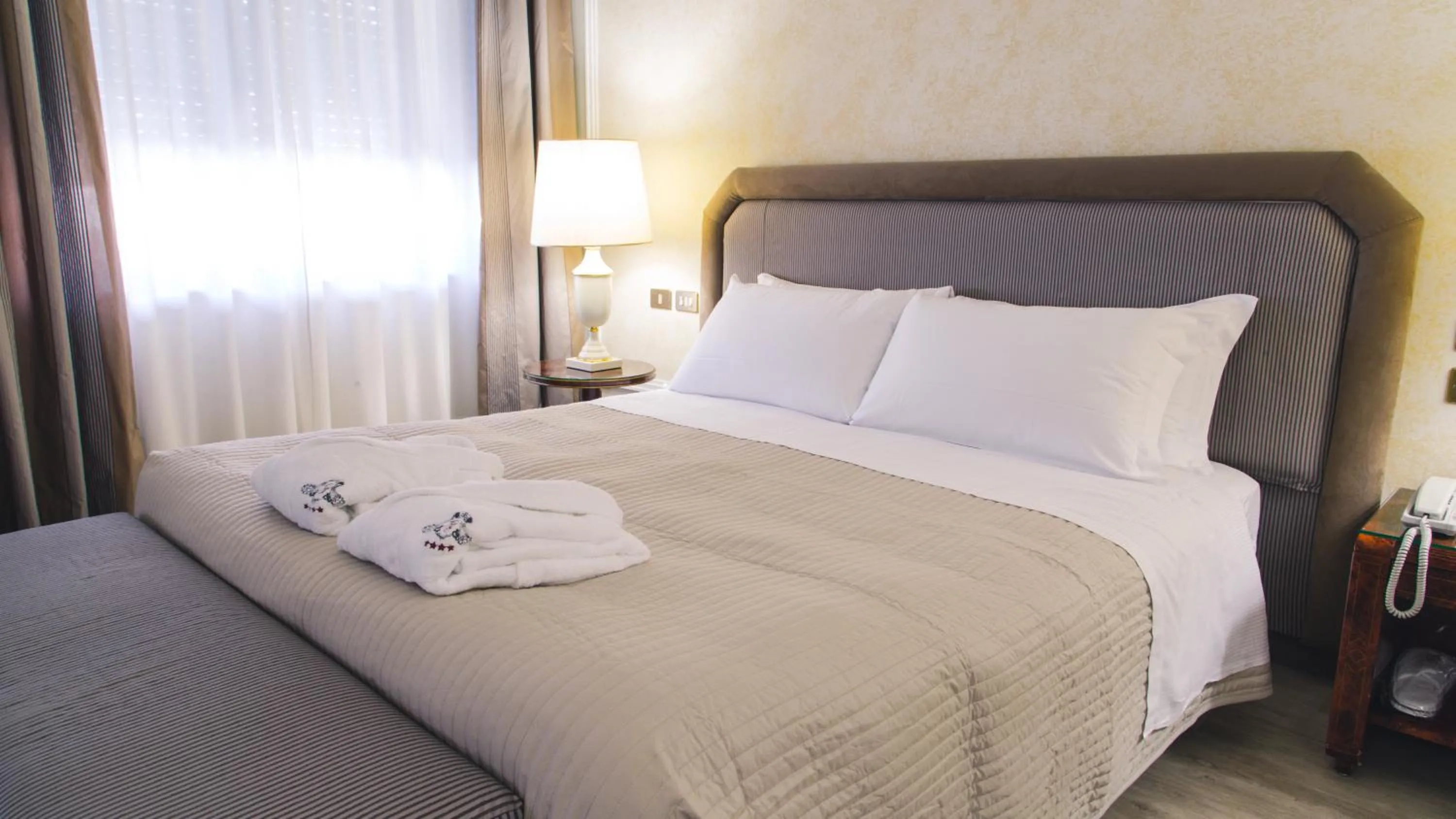 Bed in Grand Hotel Excelsior