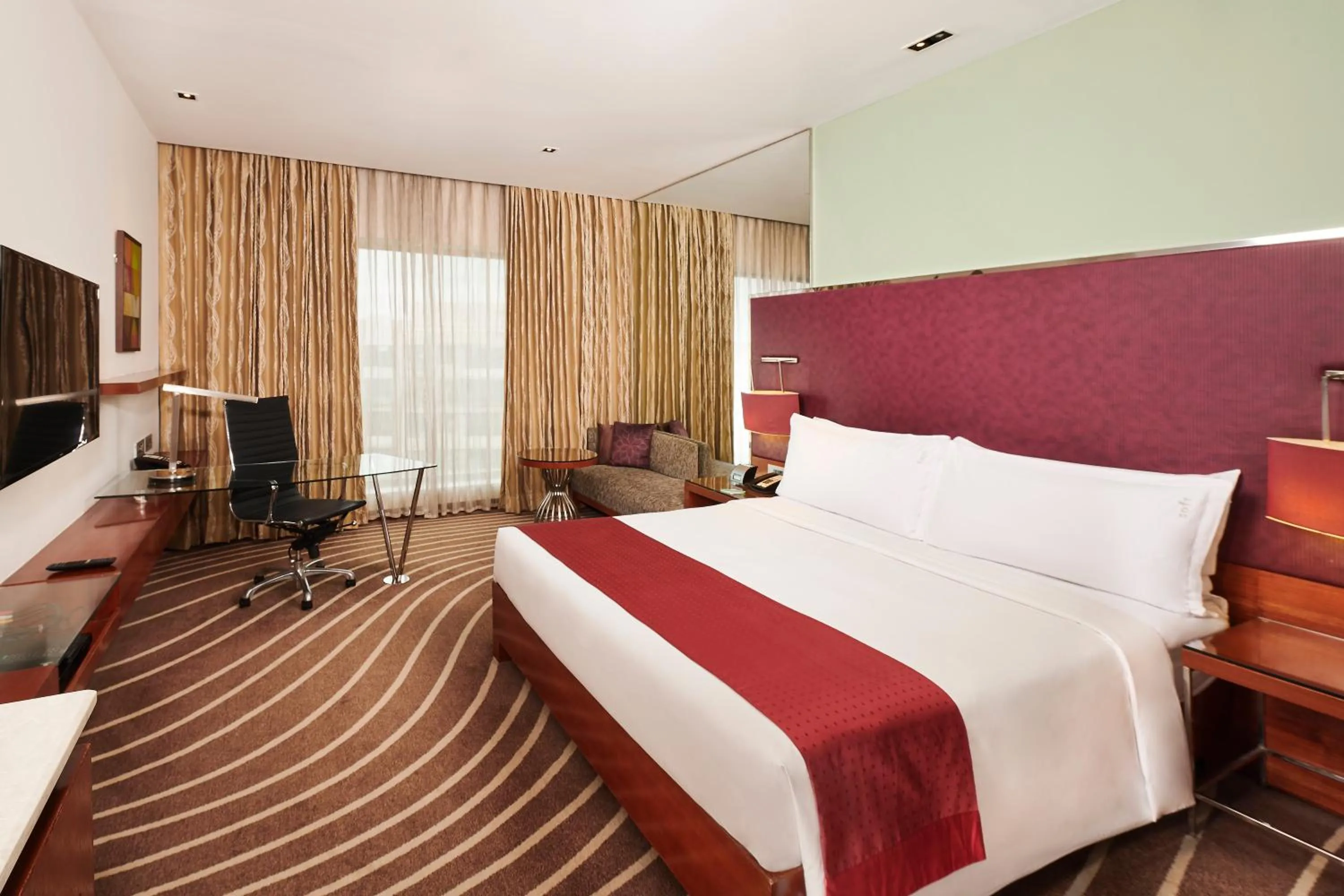 Photo of the whole room, Bed in Holiday Inn Mumbai International Airport by IHG
